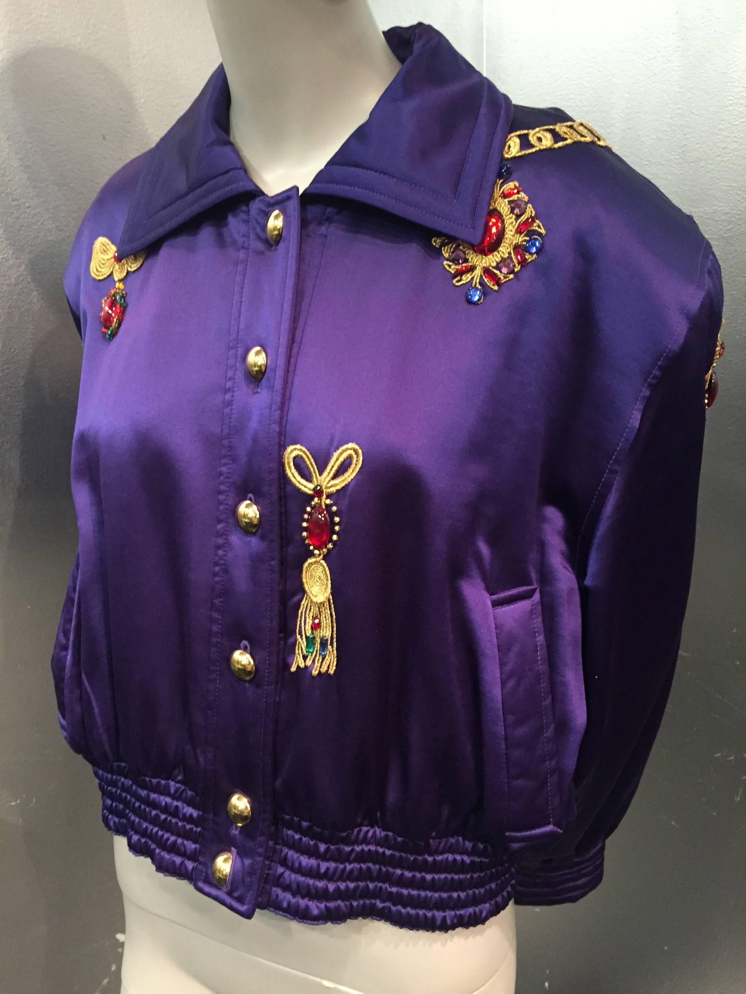 A fabulous 1980s Margaretha Ley for Escada purple and wool satin bomber jacket with padded shoulders, quilted lining and embroidered jewel embellishment.  Gorgeous and warm. 