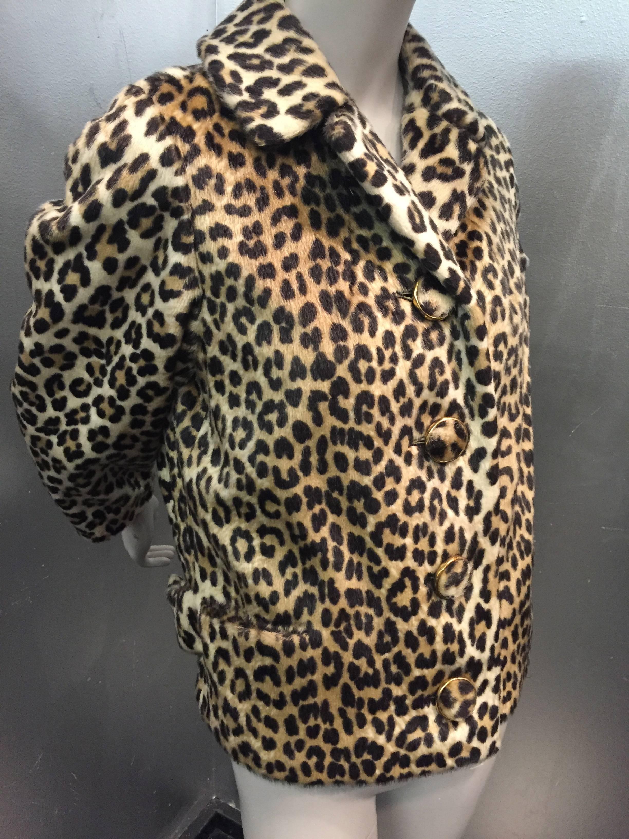A gorgeous and fabulously chic 1950s Dan Millstein wool and mohair faux leopard fur jacket with covered buttons, nice notched collar and 3/4 length sleeves.  An easy-fit boxy cut, this jacket will be soooo versatile! 