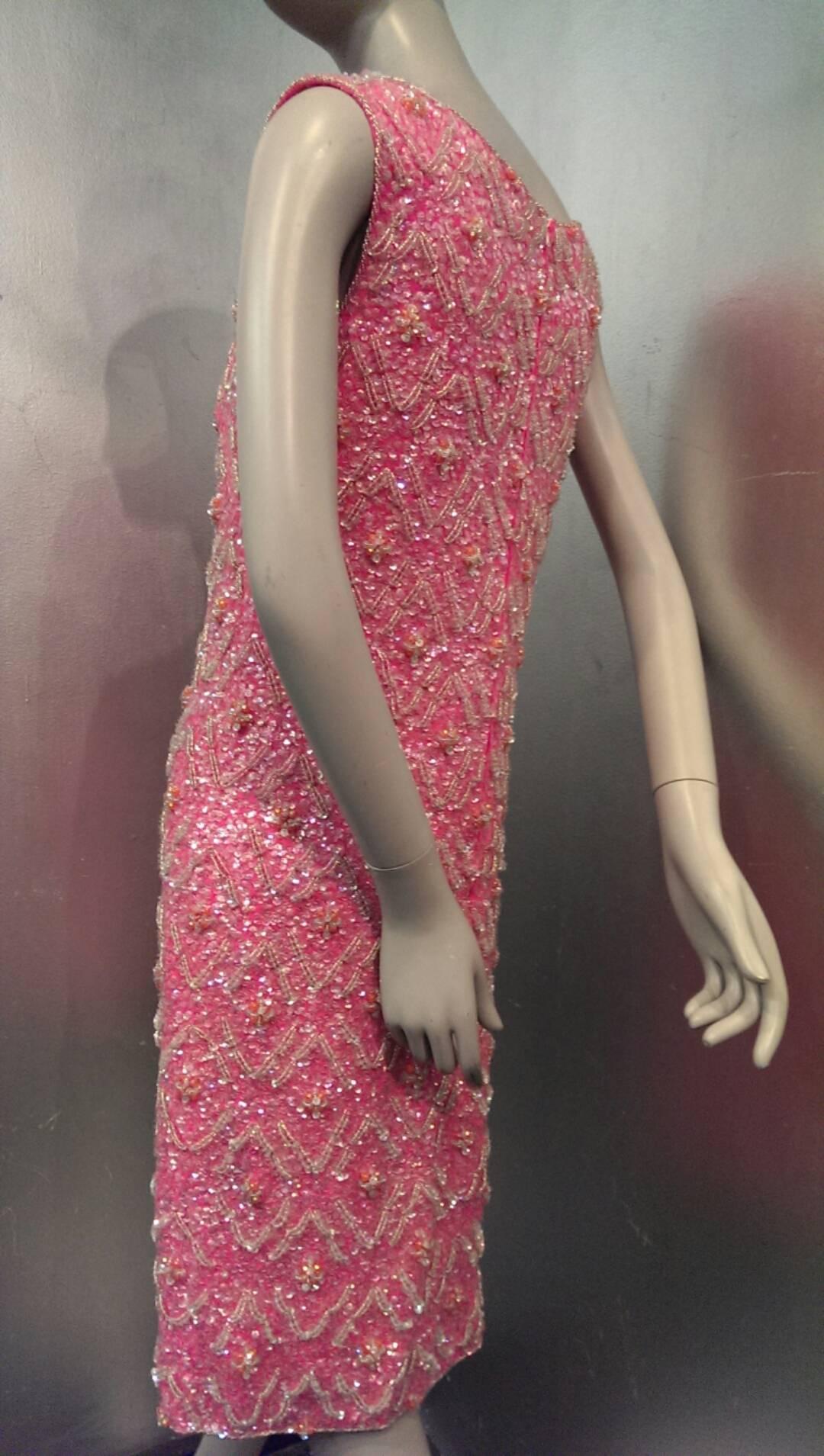 1960s I. Magnin vibrant pink wool knit dress with incredible diamond patterned bead and sequin embellishment all-over. Full lined. Back zipper. 