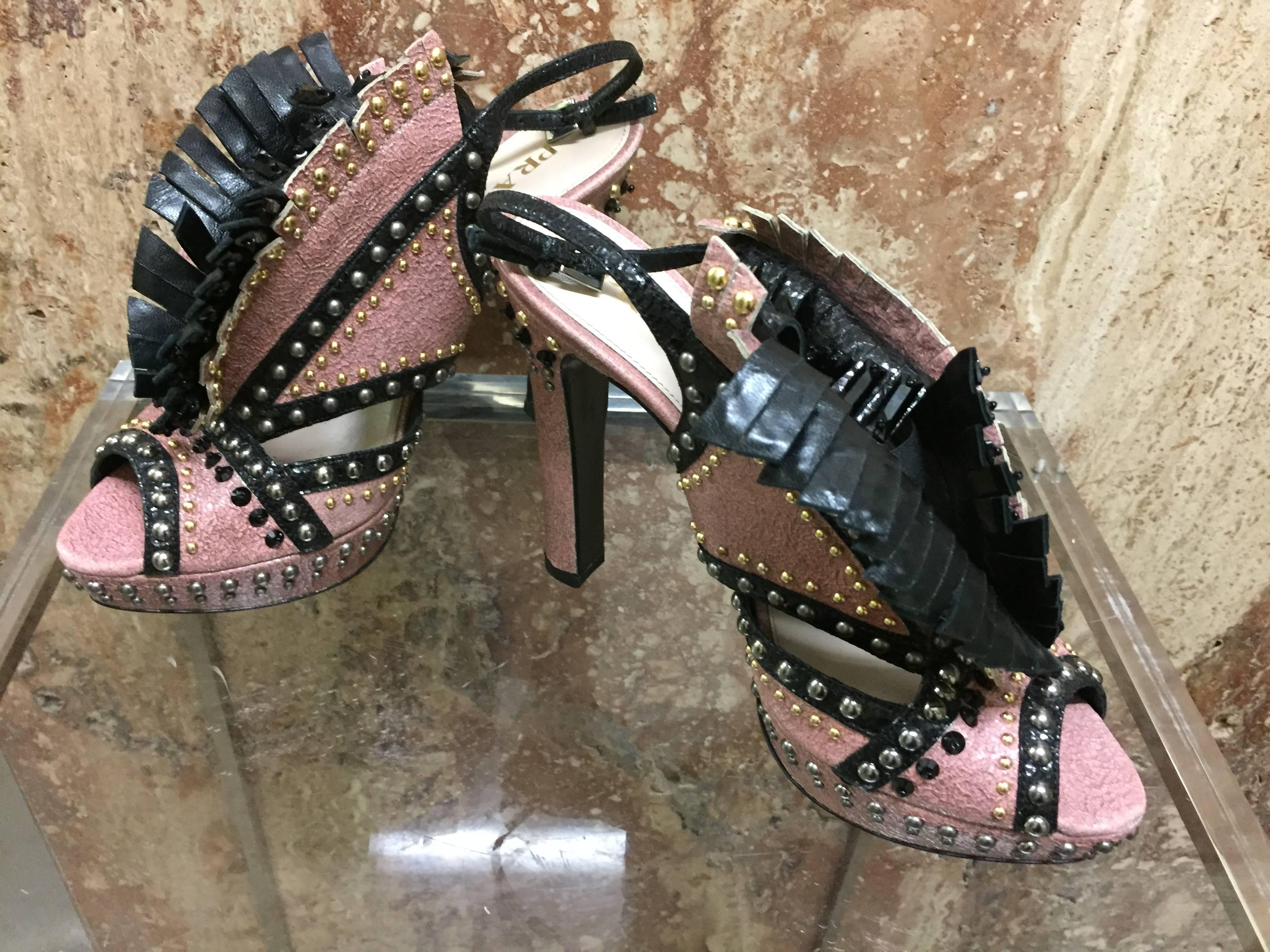 Prada pink and black distressed leather platform slingback sandals: A little Western-influenced styling to these studded beauties!  Black leather fringe at vamp.  Size 39.5. Never worn.
