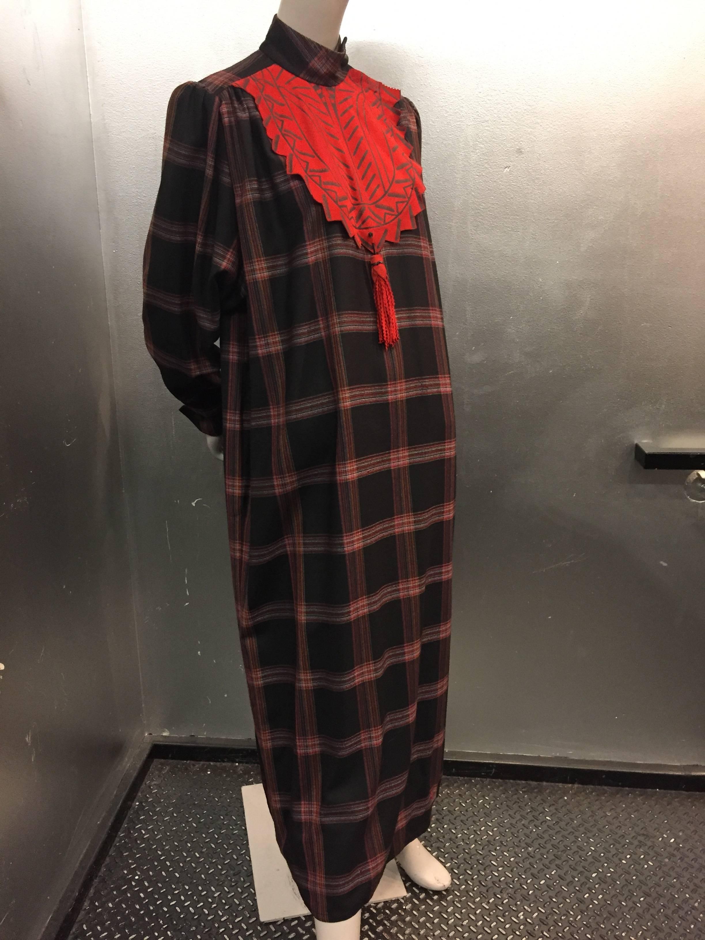 1980s Zandra Rhodes tartan plaid wool challis caftan with painted suede bib front and tassel.  Side seam pockets. Unlined. Snaps at shoulders and button at neck. Button cuffs.