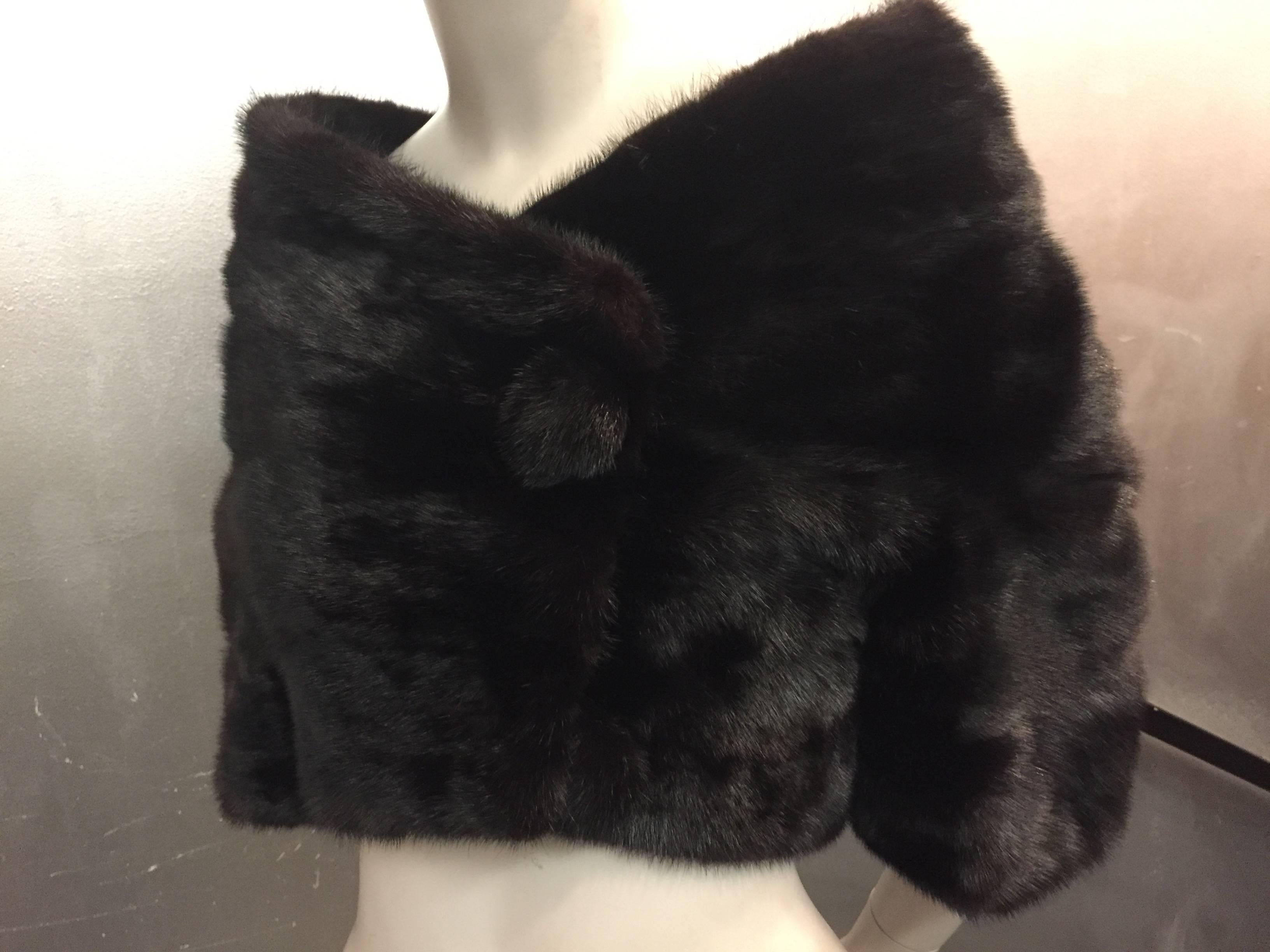 A fabulous 1960s Saks Fifth Avenue cropped black mink evening jacket with 3/4 sleeves, front fur 