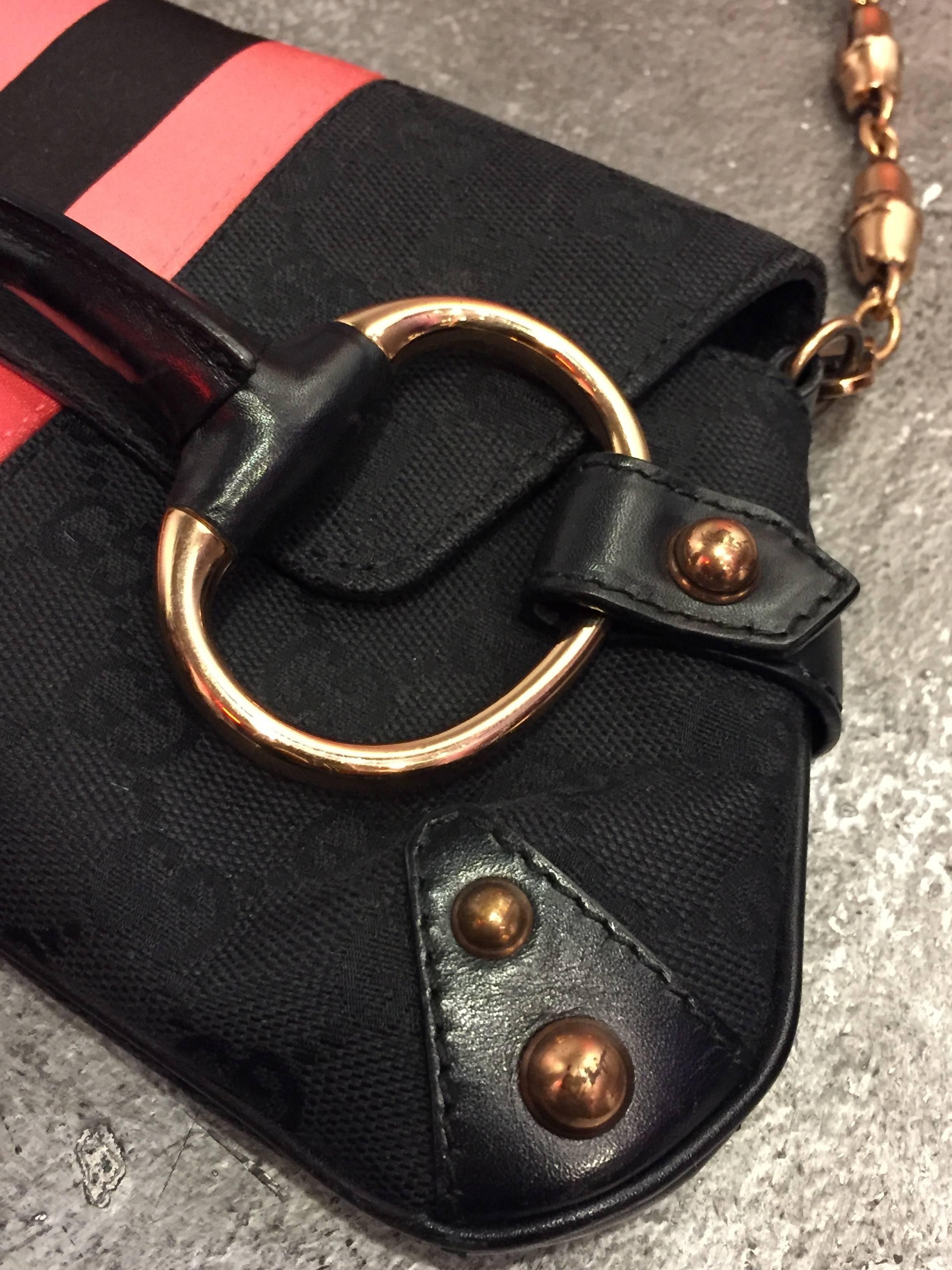 Tom Ford for Gucci, logo canvas purse with leather trim corners, D-ring snaffle bit trimmed in leather, and peau de soie racing stripe embellishment. Chain link handle is composed of links of rose gold metal molded as faux bamboo. 