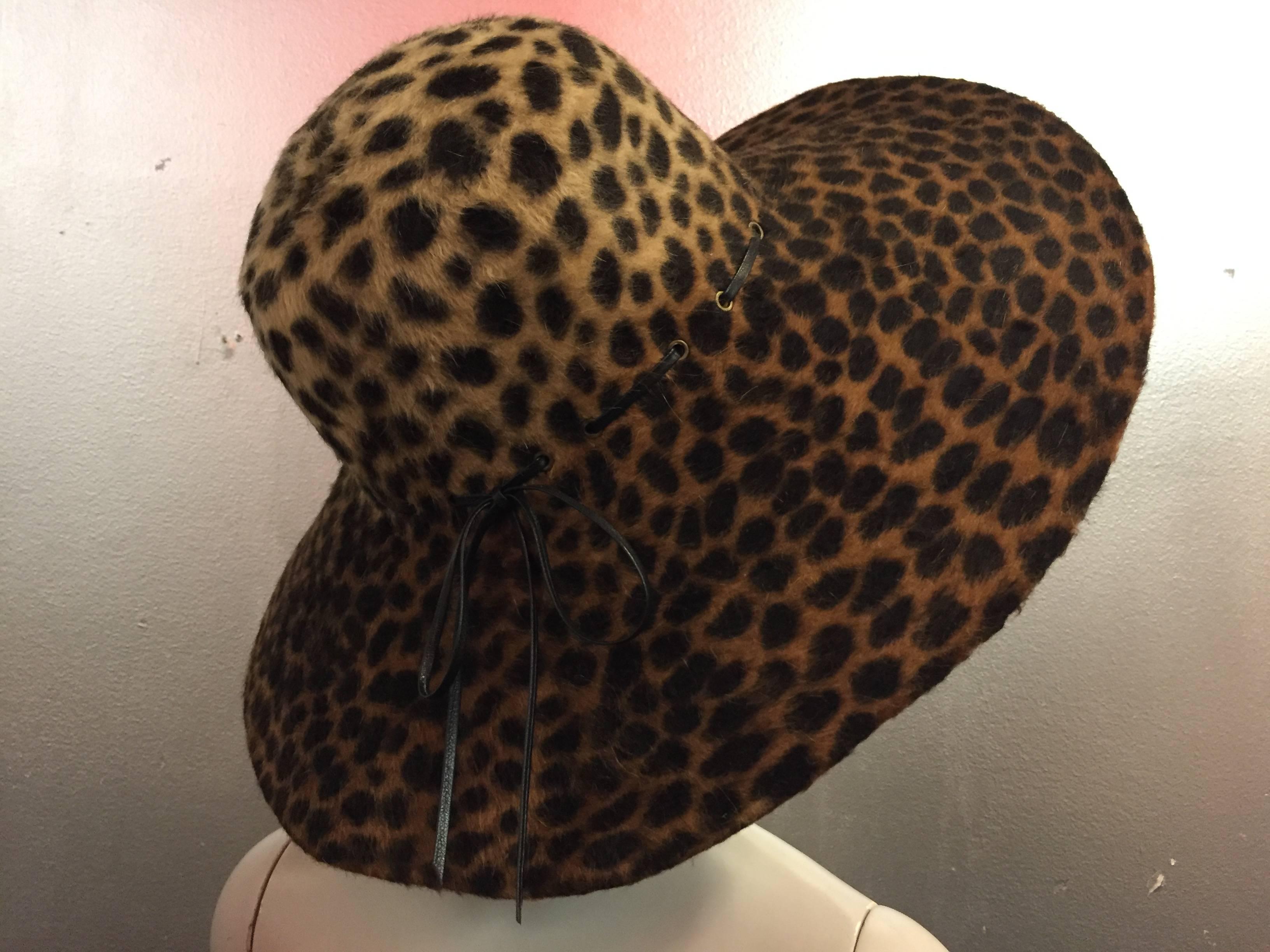 1980s Eric Javits leopard print fur felt wide brimmed hat with narrow leather tie band.  