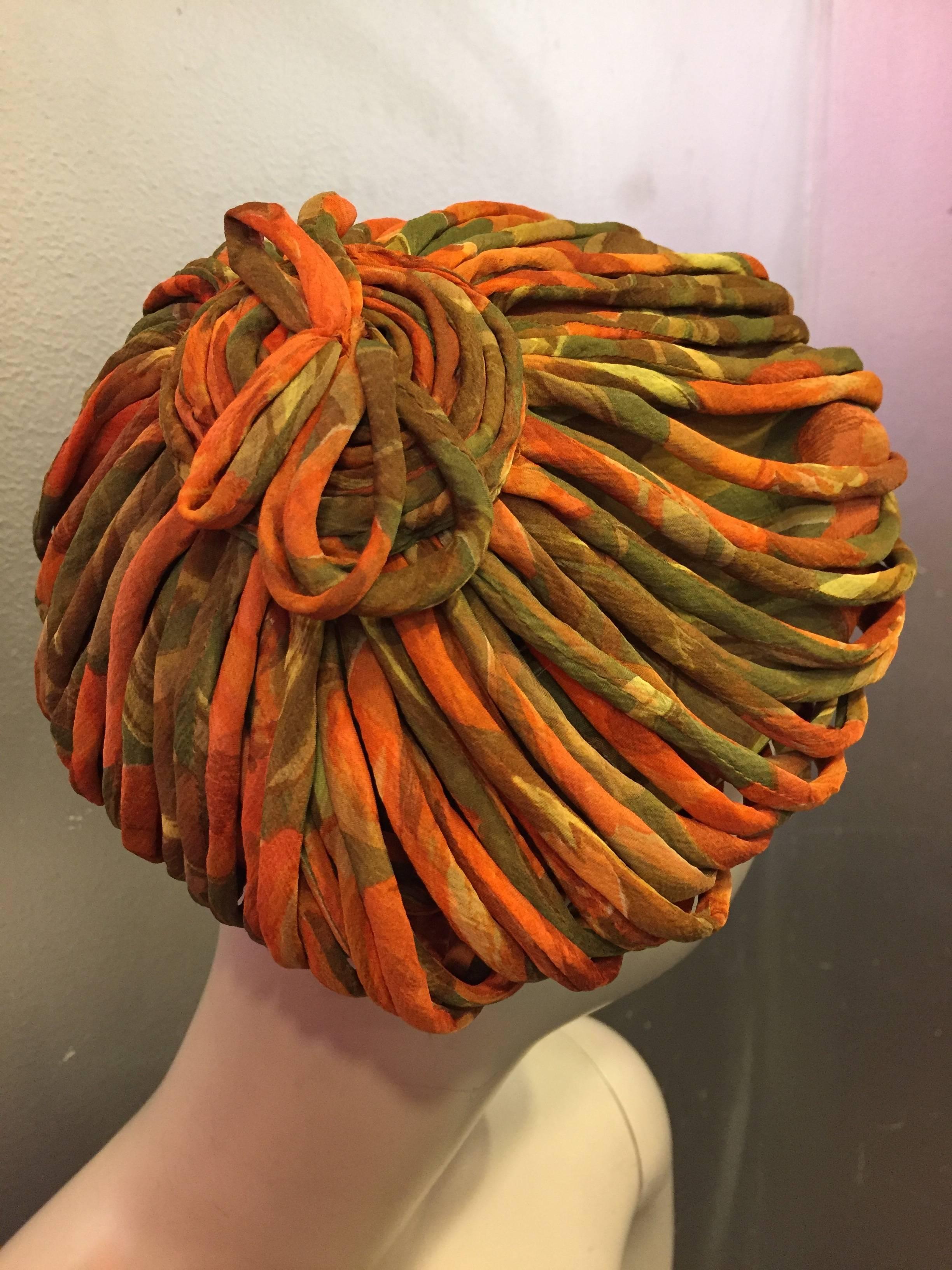 1950s James Galanos autumnal silk chiffon beret-style hat or tam constructed of bias cording with a top spiral knot. Chiffon lined with grosgrain band for structure.