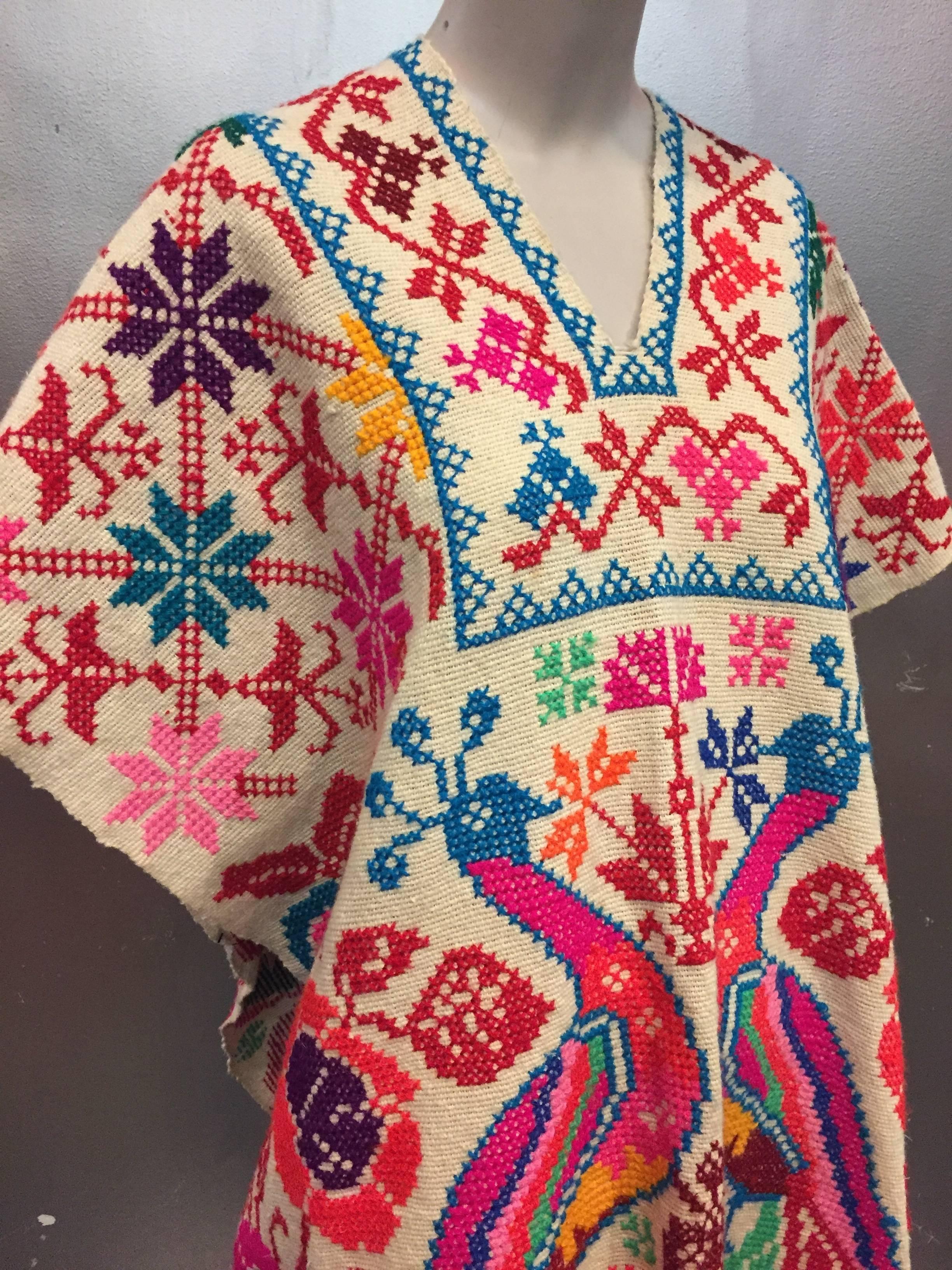 Folkloric Fluorescent Embroidered Poncho with Peacock Motif, 1970s  1