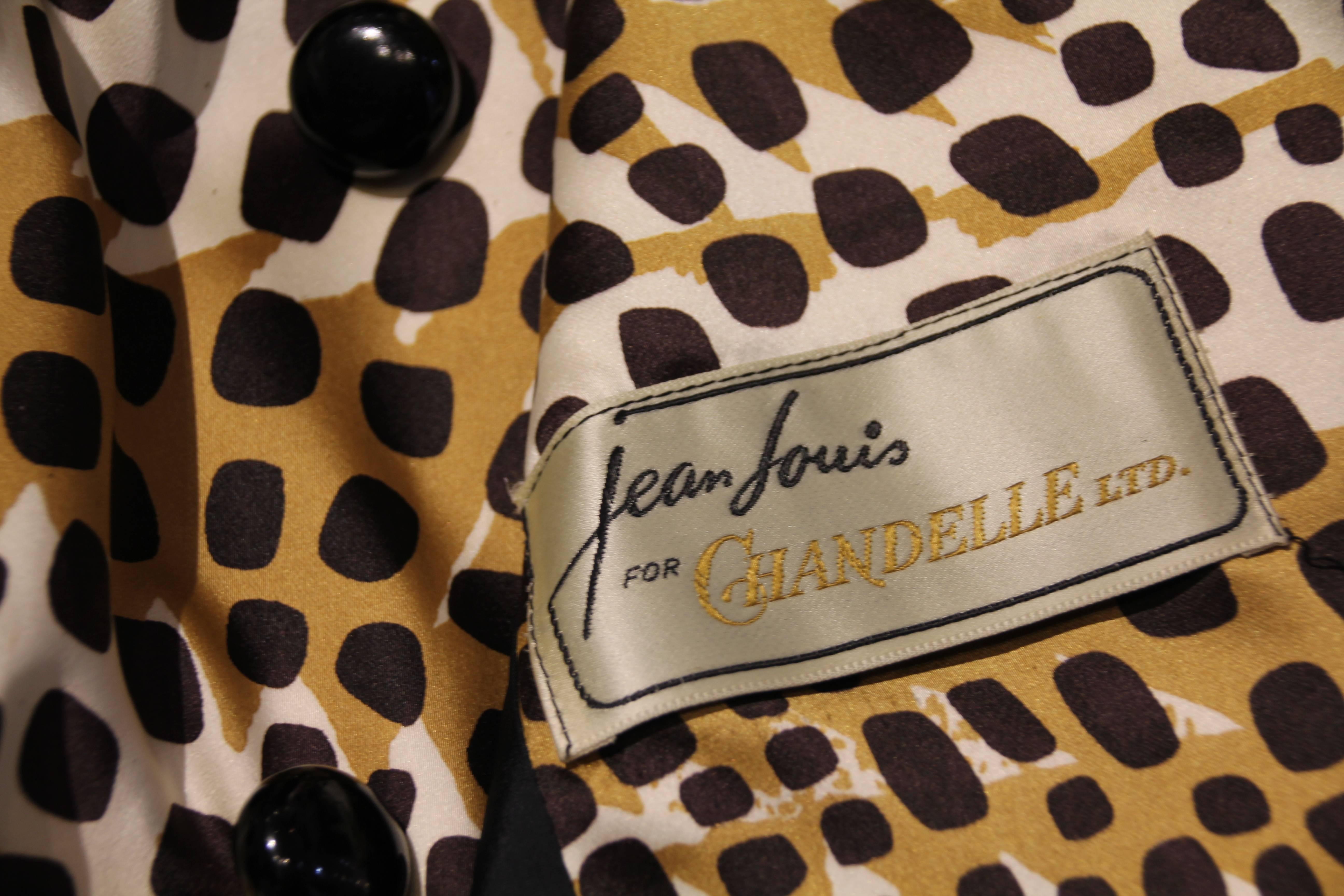 A fabulous 1960s Jean Louis for Chandelle Ltd. leopard print silk satin double breasted A-line raincoat. Lovely! 