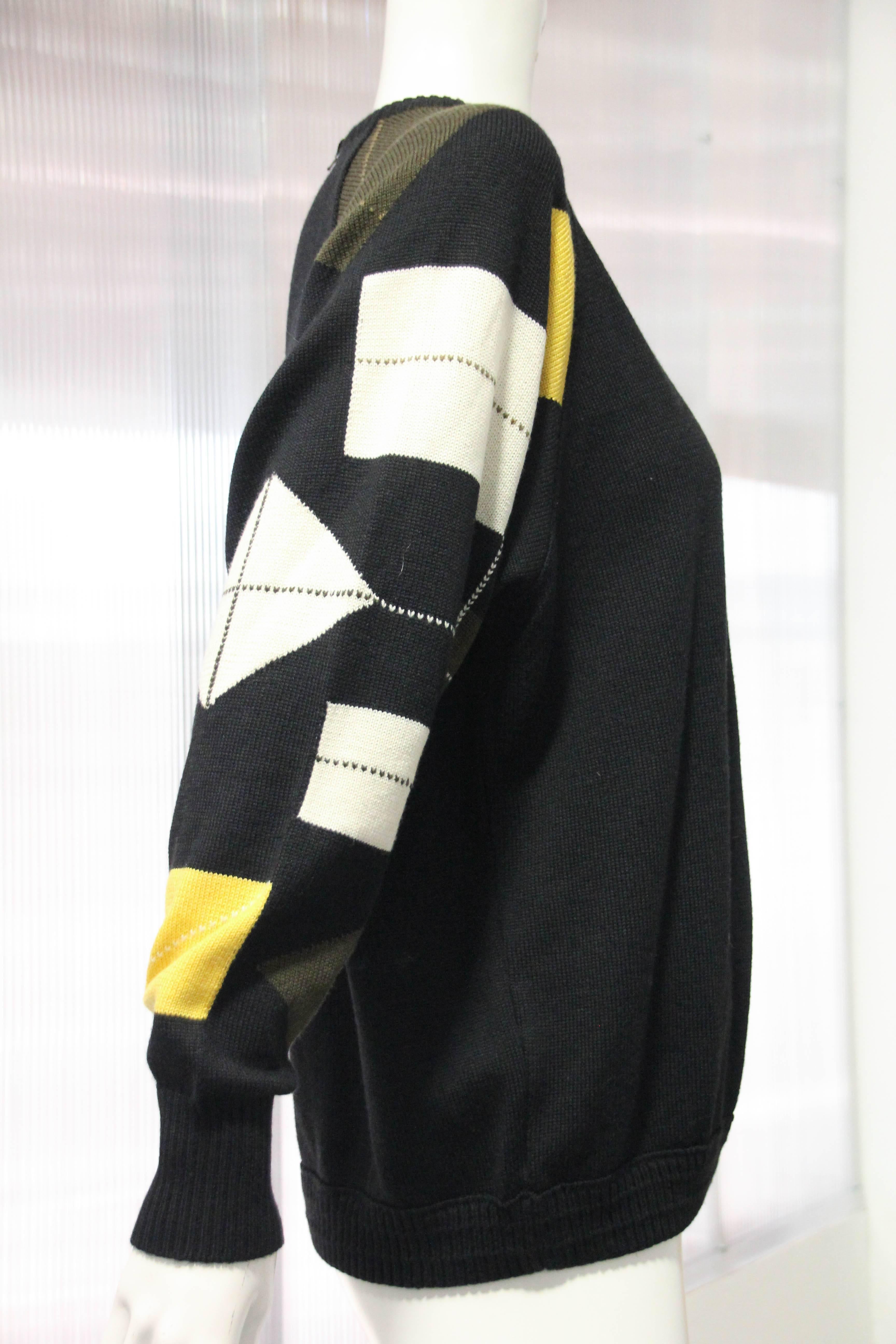 1980s Gianni Versace deconstructed argyle patterned wool sweater with grosgrain trimmed back zipper. Over-sized fit.