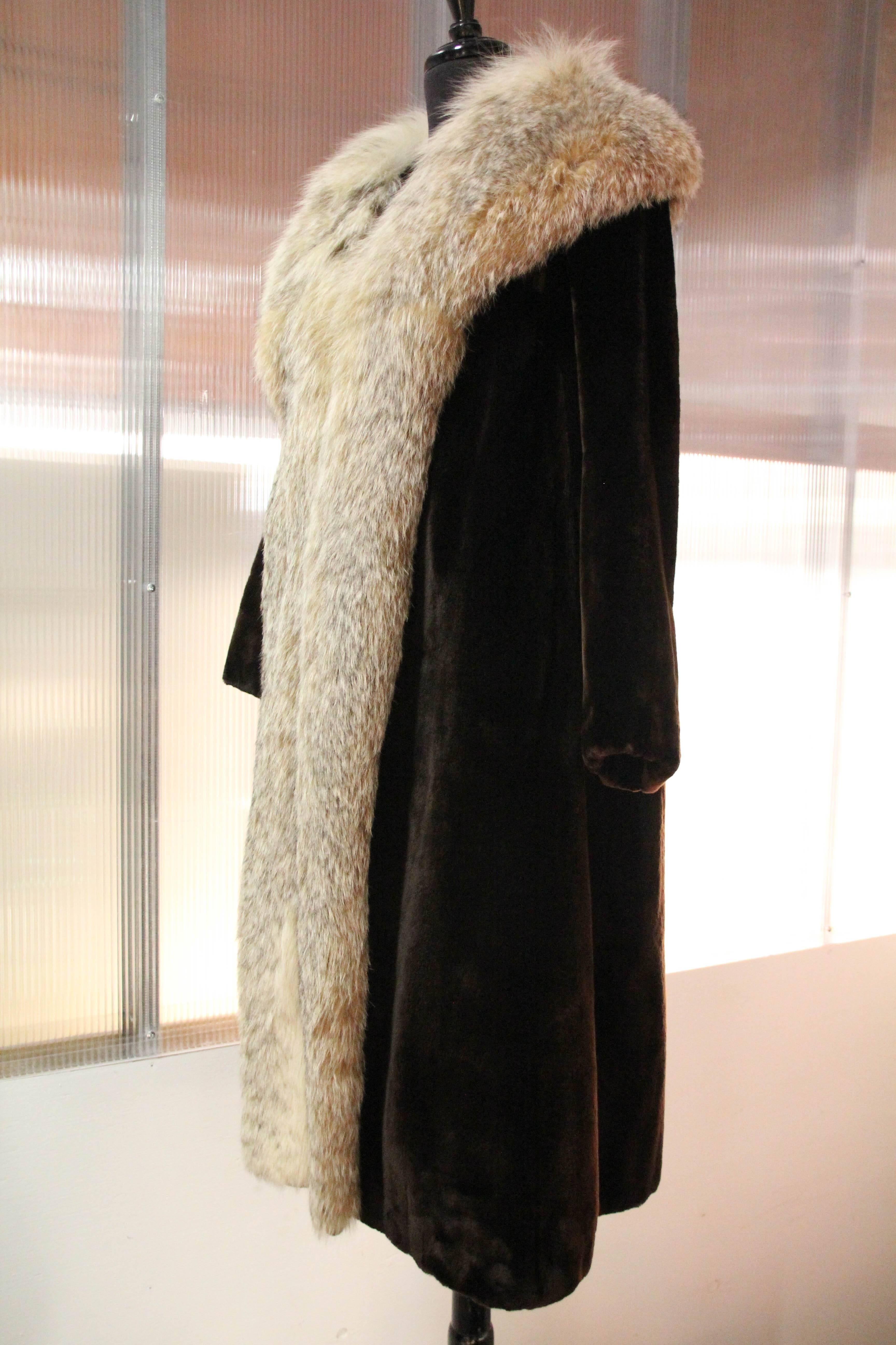 1960s Sheared beaver coat with plush Lynx collar and trim. silk lined. Made by Herbert's, San Francisco's finest fur salon at the time.  Bracelet length sleeves. Fits up to a size 12.