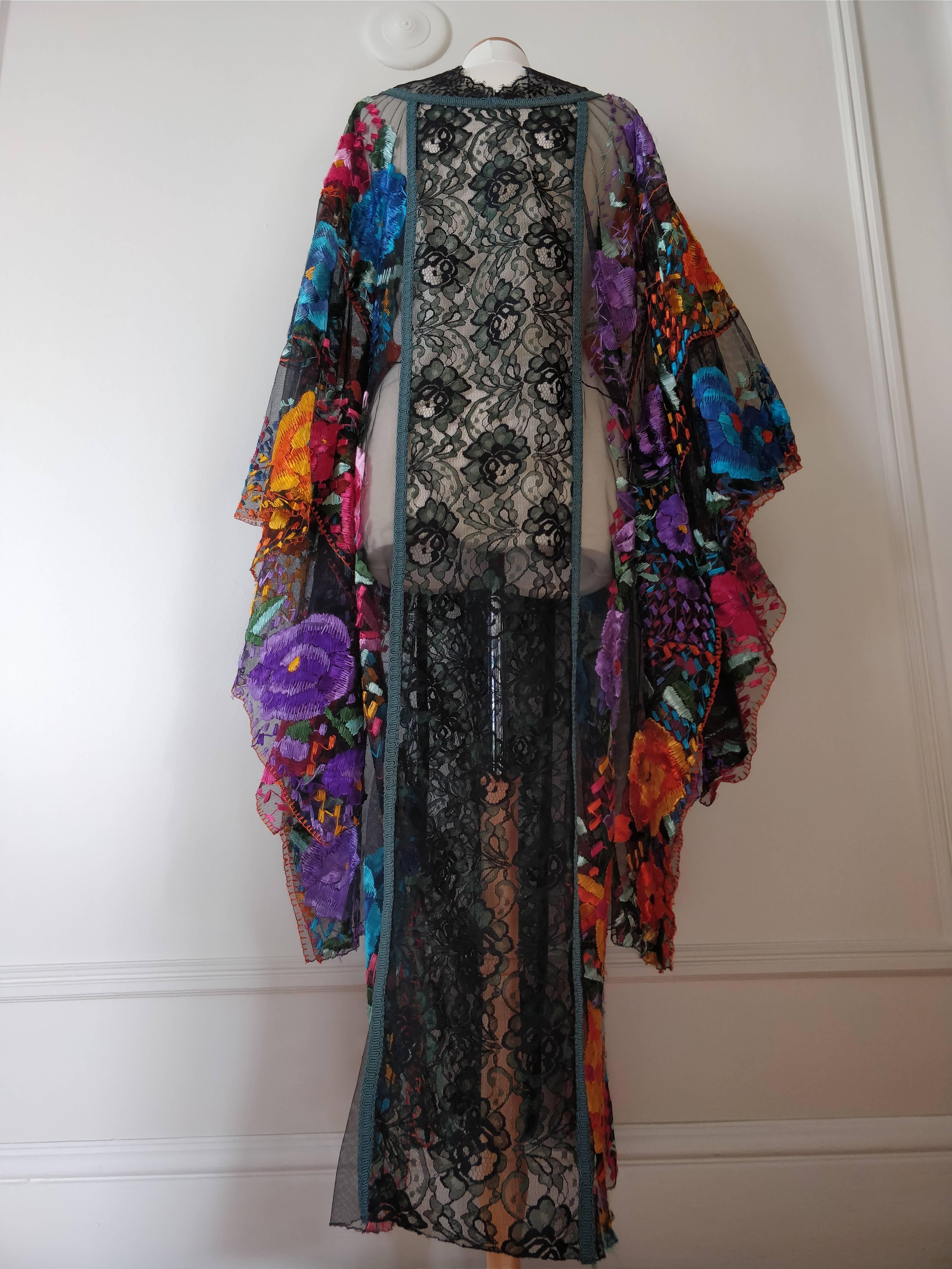 1950s Net and mixed lace caftan with traditional Mexican embroidery panels. 
Custom made in the style of Thea Porter. Fits up to a size modern 10.