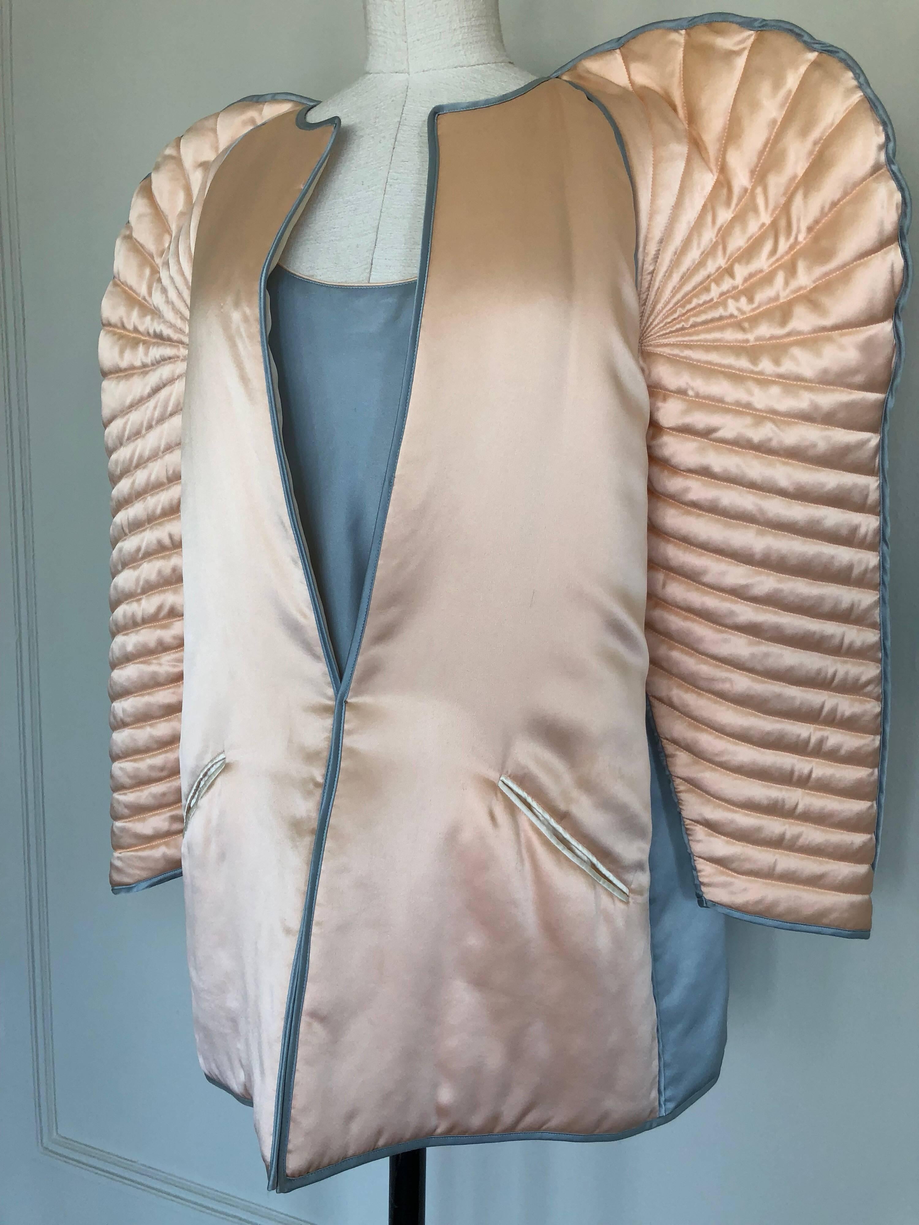 This dramatic Fernando Sanchez quilted bed jacket ensemble was featured in American Vogue c.1983 and was shot by Helmet Newton. Fernando Sanchez was known for his provocative lingerie collections, which, though designed for elegant boudoirs, were