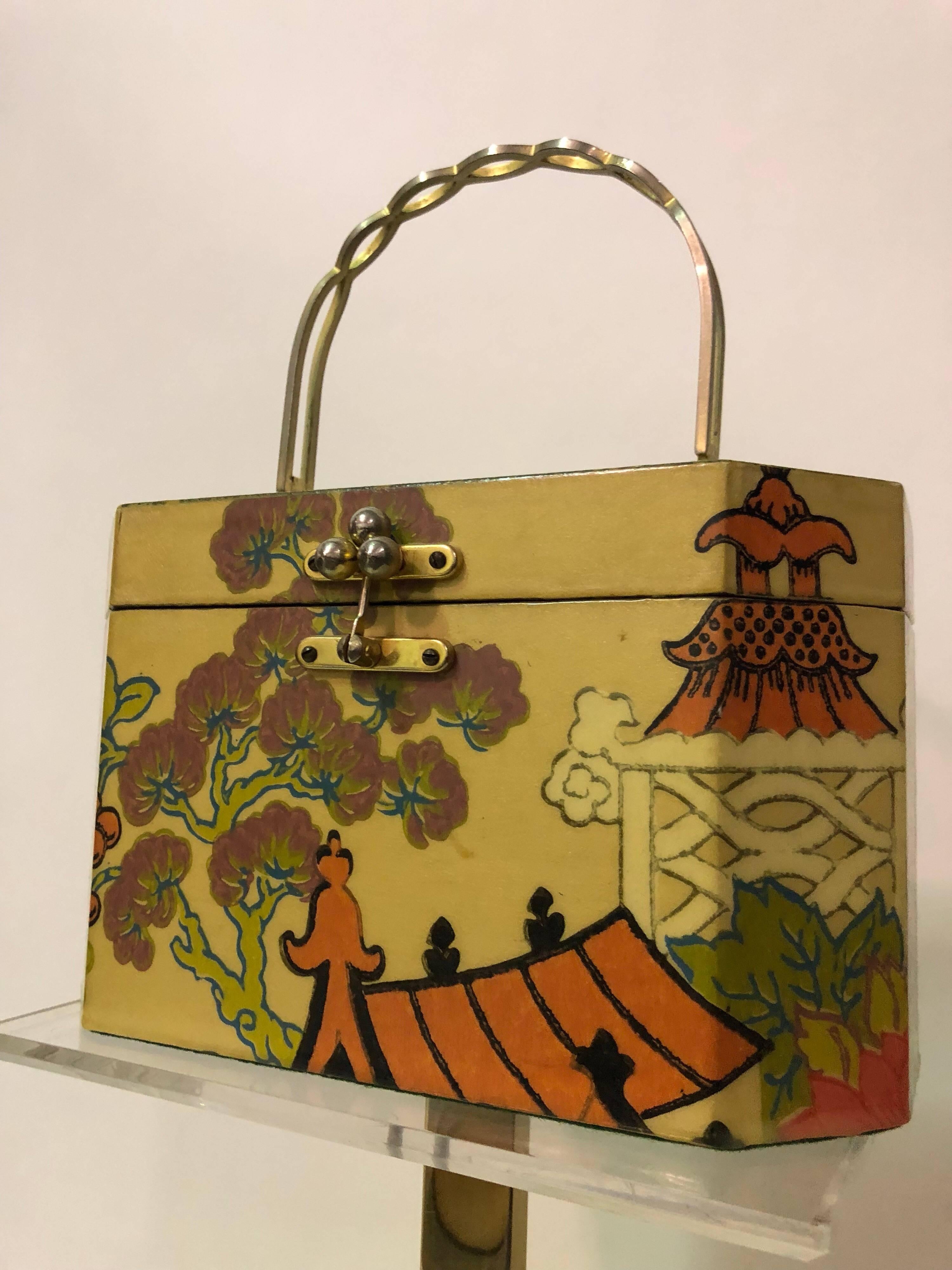 1960s Annie Laurie Originals - Palm Beach octagonal box bag with hinged lid and metal arched handle. Inside is quilted green fabric and outside is covered in a stylized Chinese motif with pagoda and figures. 