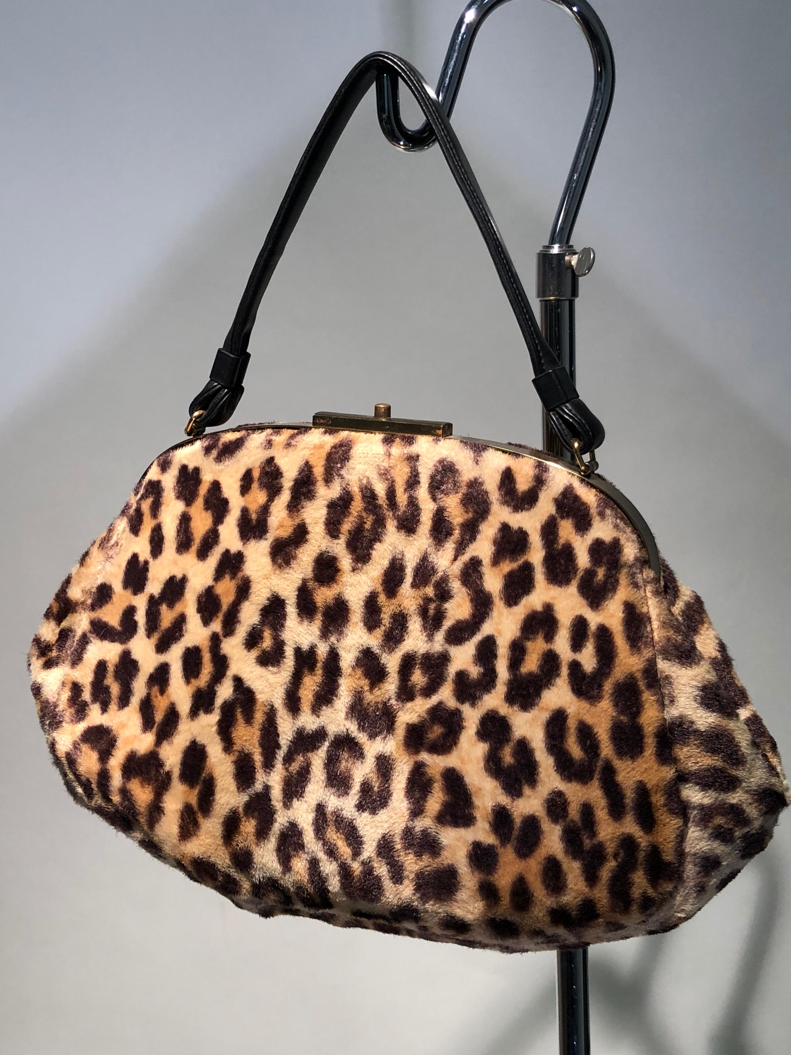 A fantastic and large Ingber 1960s faux leopard structured doctor's bag style handbag. Brass closure and top frame. Leather handle.  Wonderful quality of construction. Meeeow!