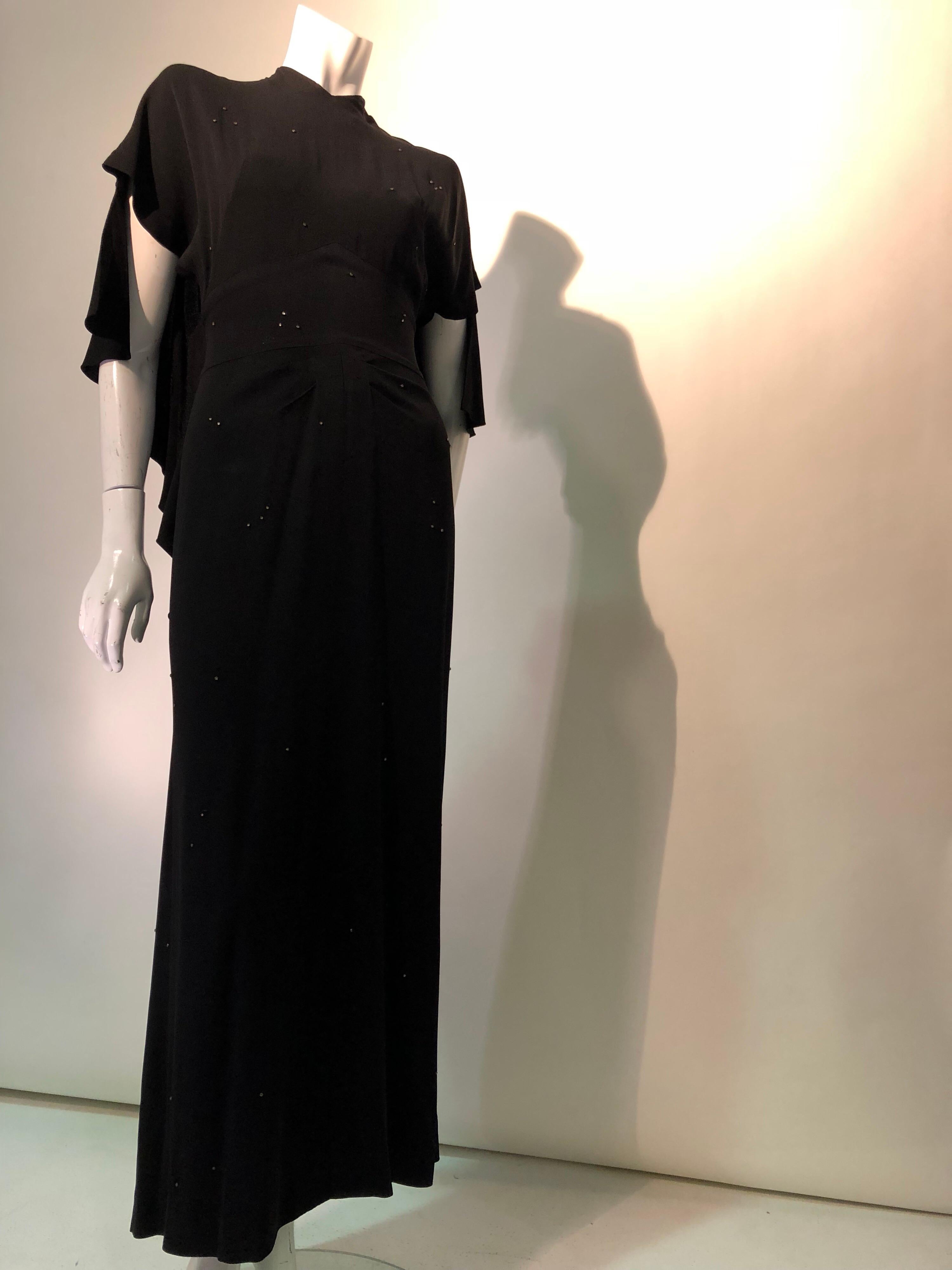 Women's Gilbert Adrian Black Crepe Gown With Shoulder Drape / Back and Front Slit, 1940 For Sale