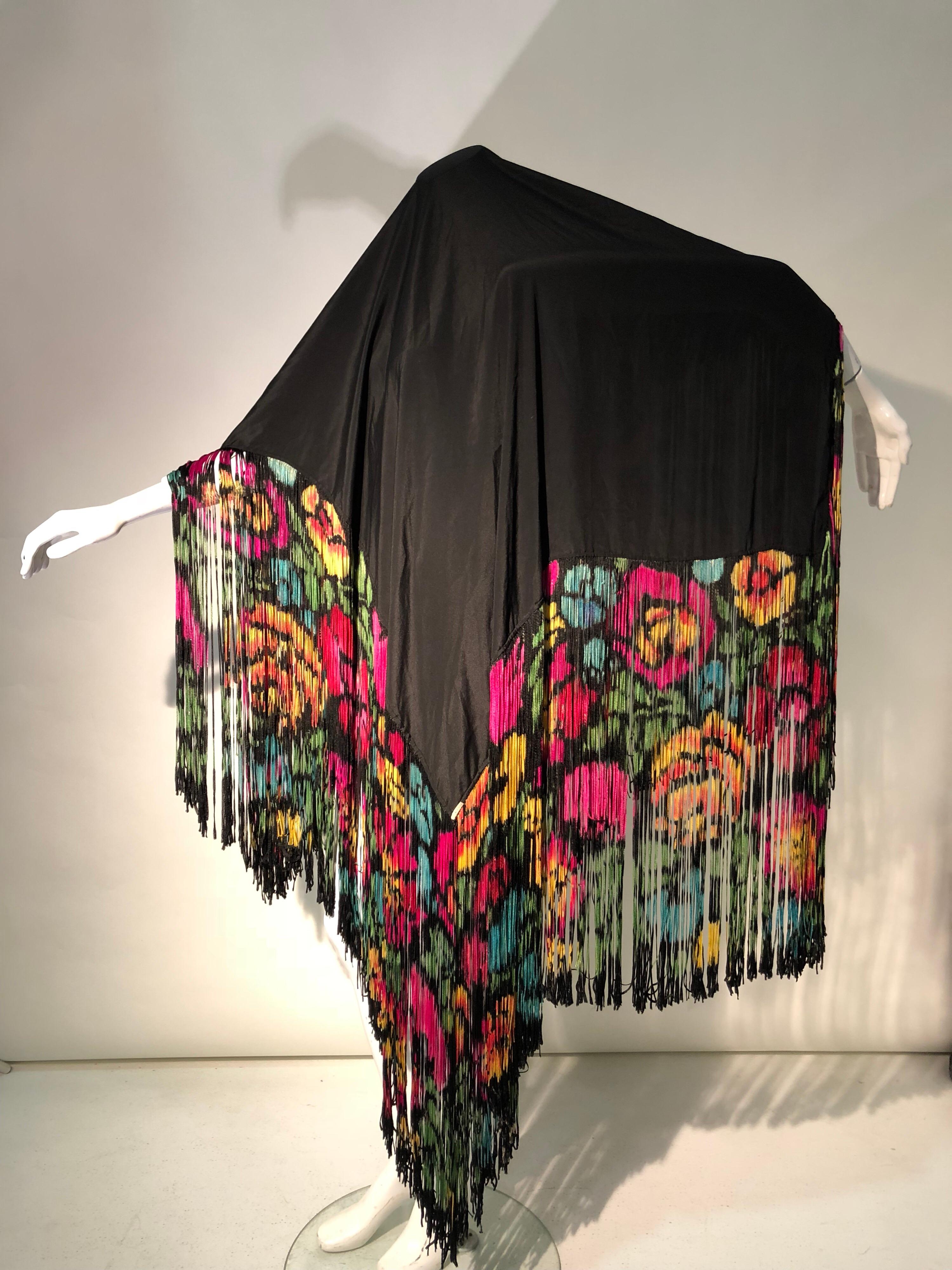 A rare 1920s large French-made black silk shawl with incredible vibrantly hand-painted (dyed, not stiff) long Art Deco floral fringe! A stunning statement piece. Tagged 