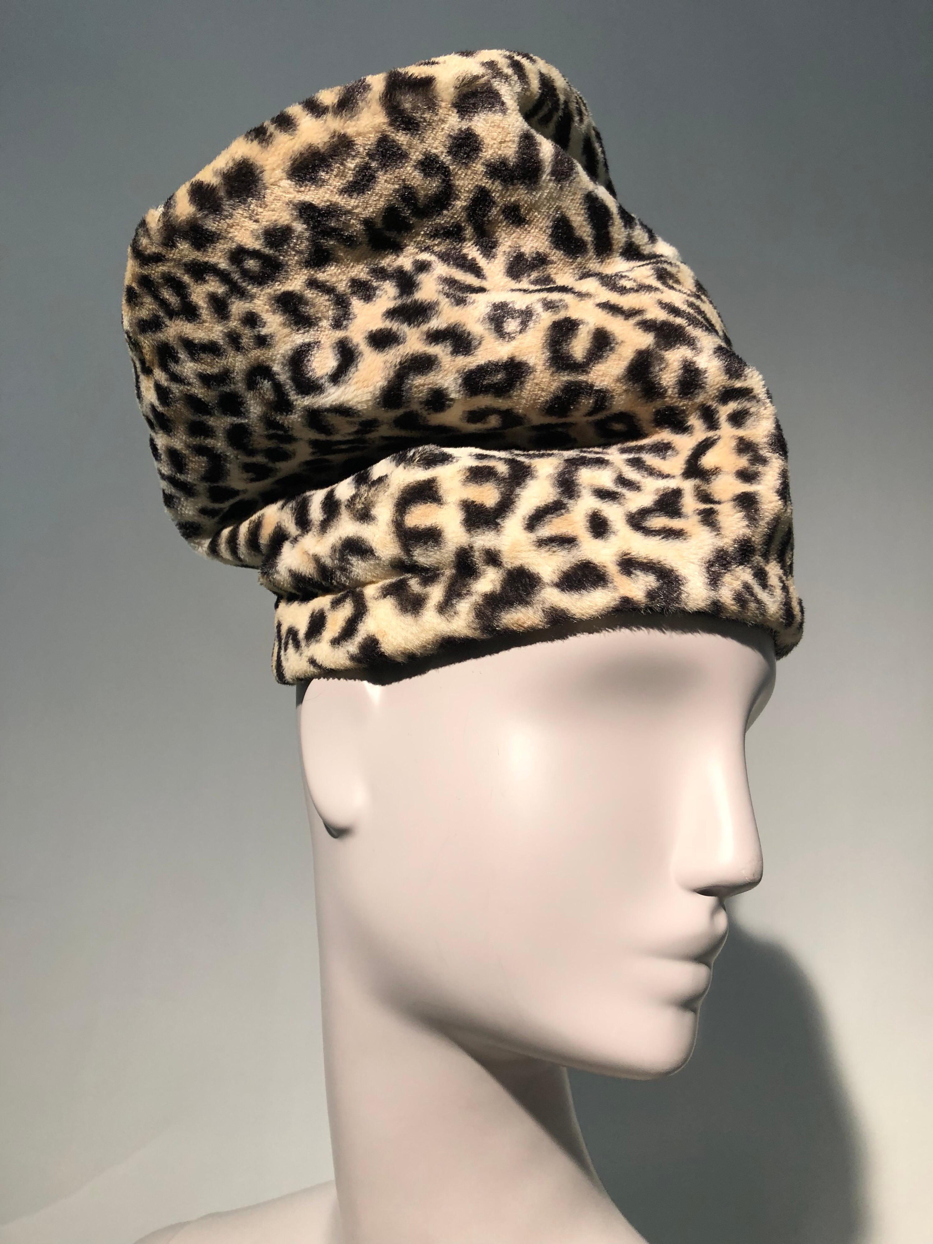 An unusual and daring 1960s Dachettes by Lilly Daché extra tall slouchy faux leopard hat in a stovepipe shape. No brim. The talk of the party!