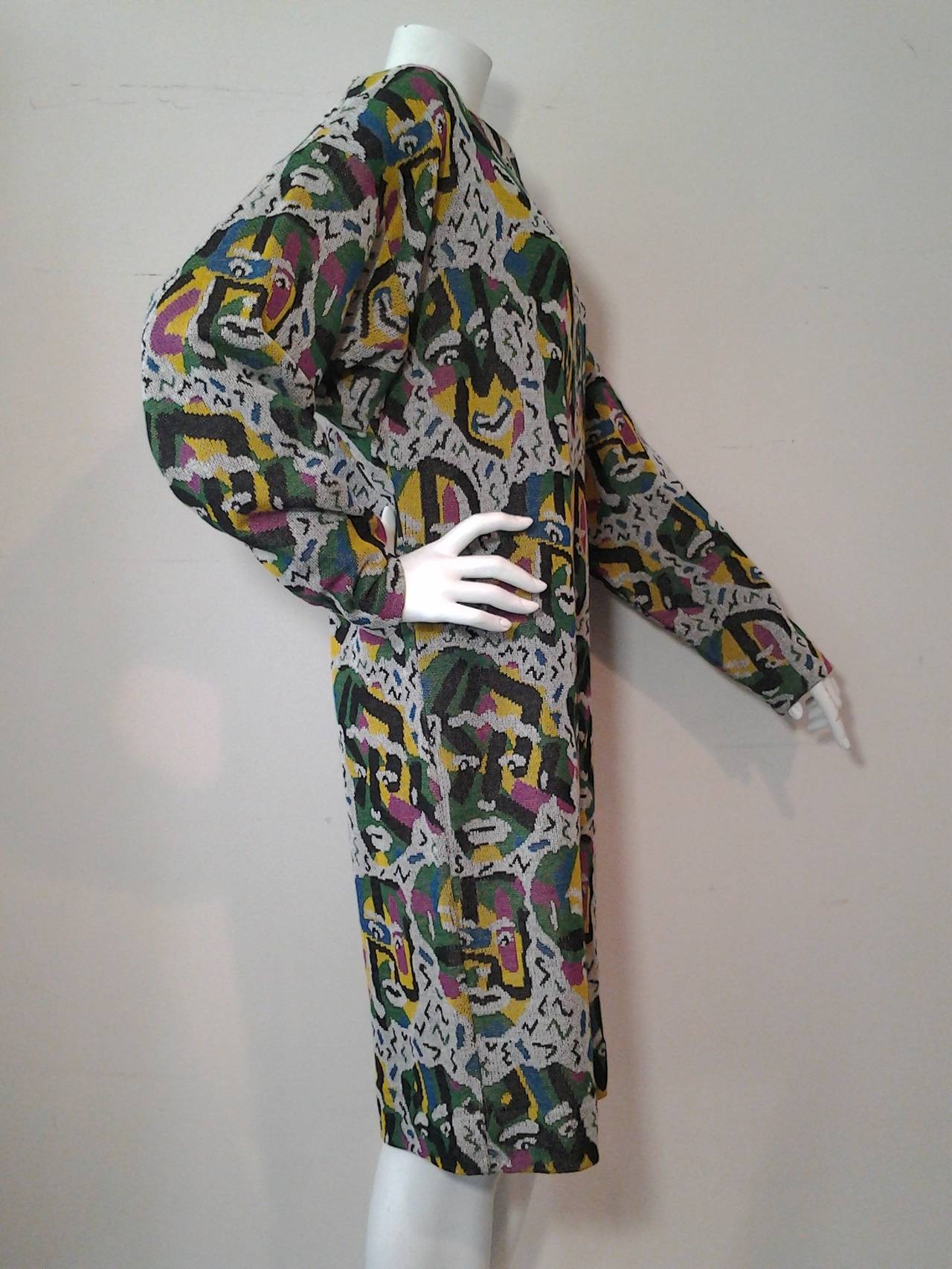 A fabulous knee-length 1980s Missoni lightweight knit sweater dress or tunic with abstract face or mask pattern woven in.