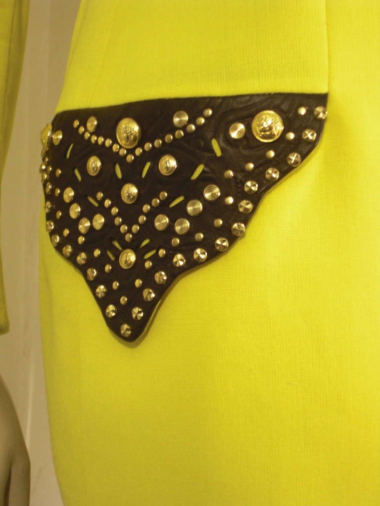 1980s Gianni Versace lemon yellow single breasted blazer with heavily studded leather pocket flaps.  Fully lined. Size