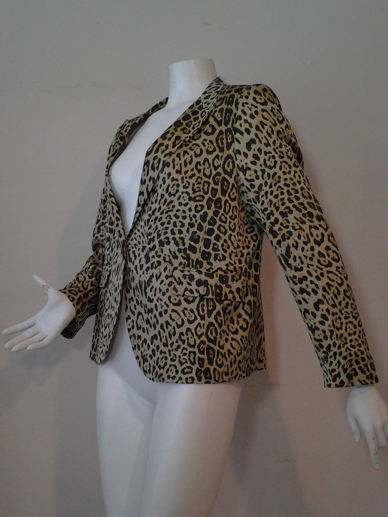 A fabulous 1980s Krizia leopard print silk faille jacket with single button closure.