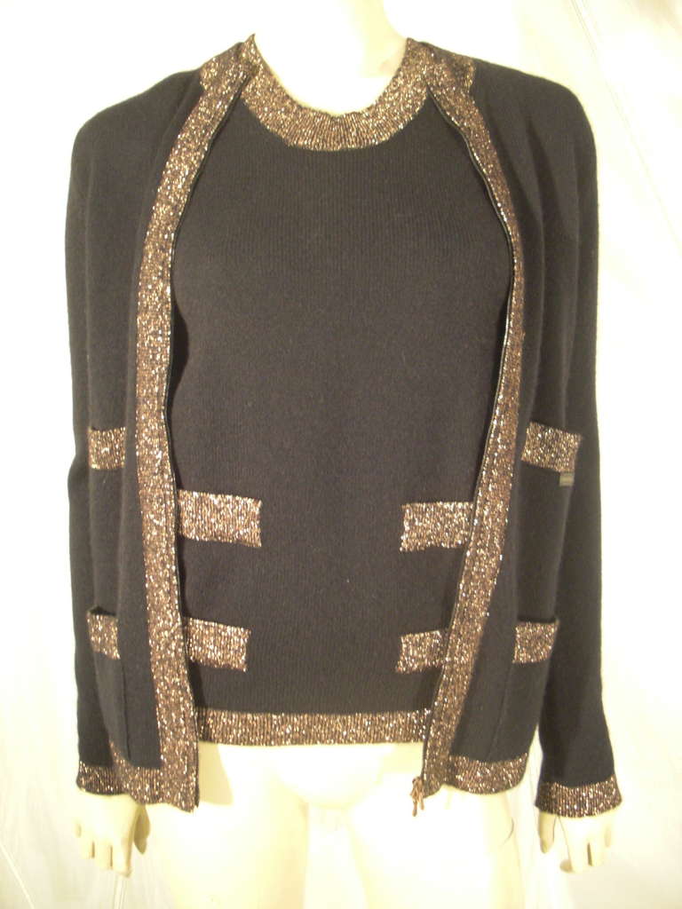 A classic Chanel black cashmere twin set: Top and bottom opening zippered cardigan and tank with copper lurex trim!
