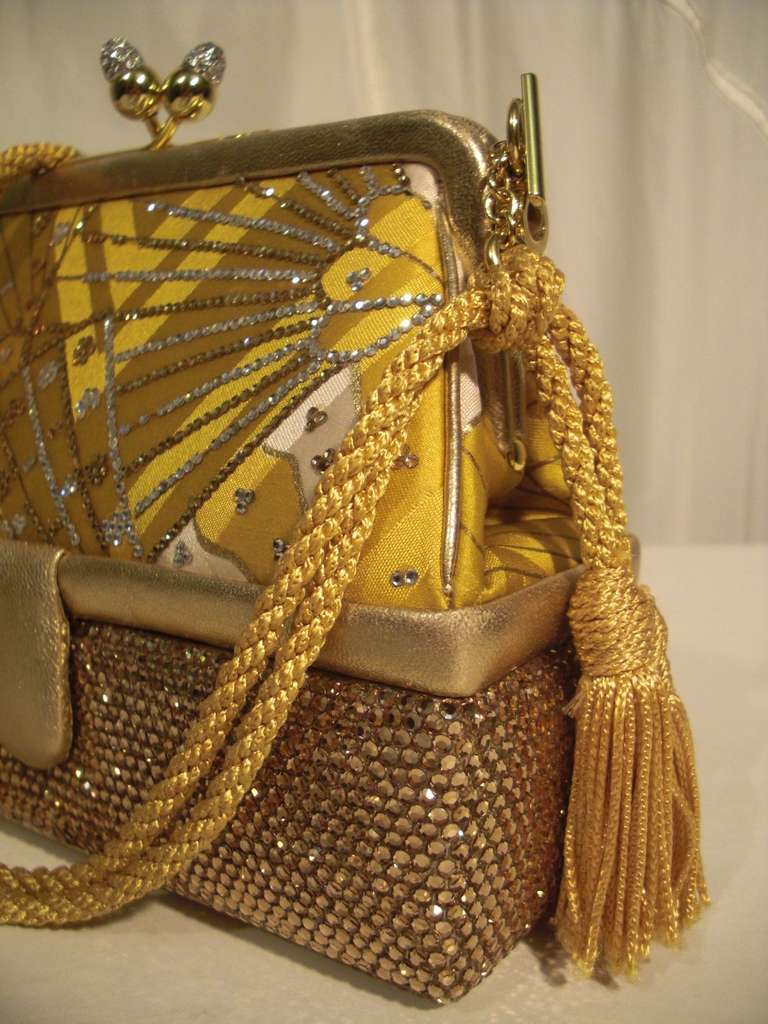 80s Judith Leiber Gold Box Bag with Oriental Fan Motif

Gold Cord and Tassel Handle