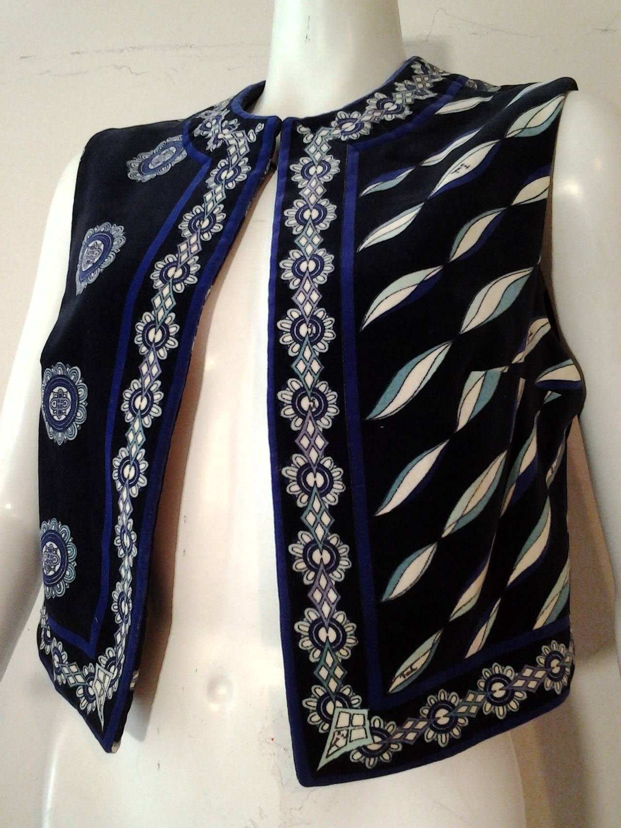 A fabulous fitted 1960s Mod Emilio Pucci cotton velveteen vest in black, shades of blue and white.  Darted at bust and one single closure at neck. Lined.