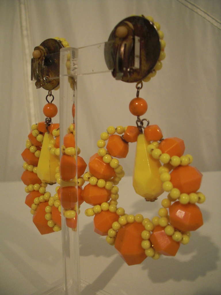 1960s Large beaded hoop clip-on earrings in lemon-yellow and orange acrylic.  4