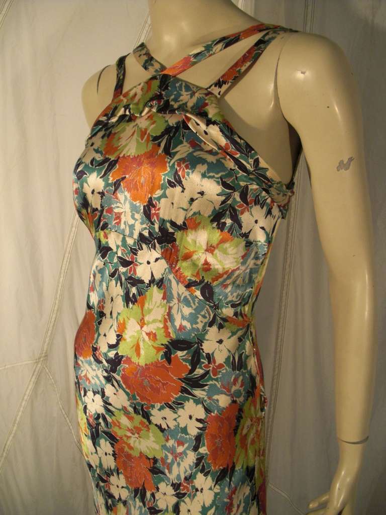 1930s Floral rayon satin bias cut gown with straps and low back.