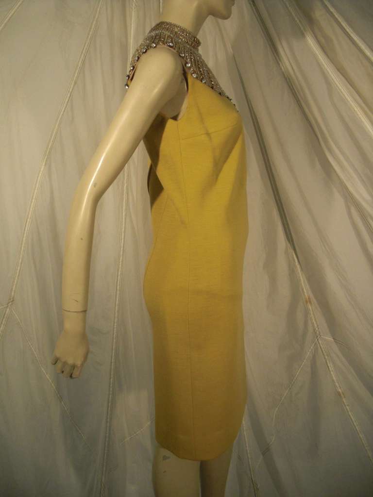 Fabulous, never-worn, 1960s Mr. Blackwell goldenrod wool knit cocktail dress.  Fully lined w/ sequined and jeweled 