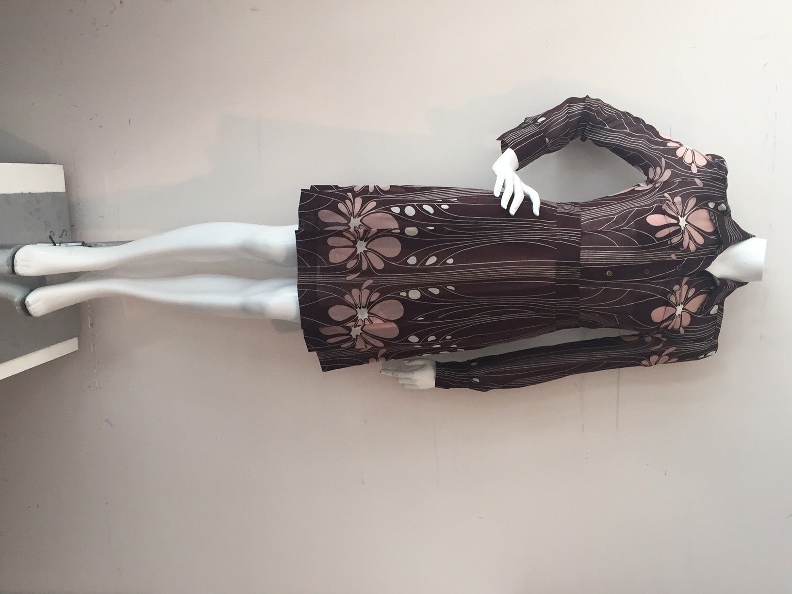 A fun 1990s Miu Miu Shirtfront dress in brown and pink lightweight wool gauze.  Cuffs and pockets at front of shirt.  Pleated skirt.
