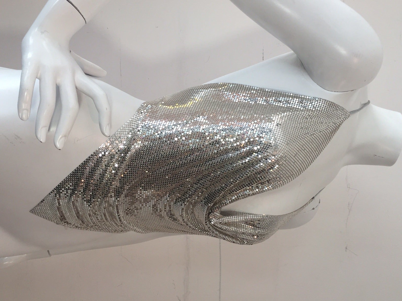A fabulously sexy 1970s Whiting and Davis silver metal mesh halter disco top.  Ties at waist and neck in silver metallic leather.