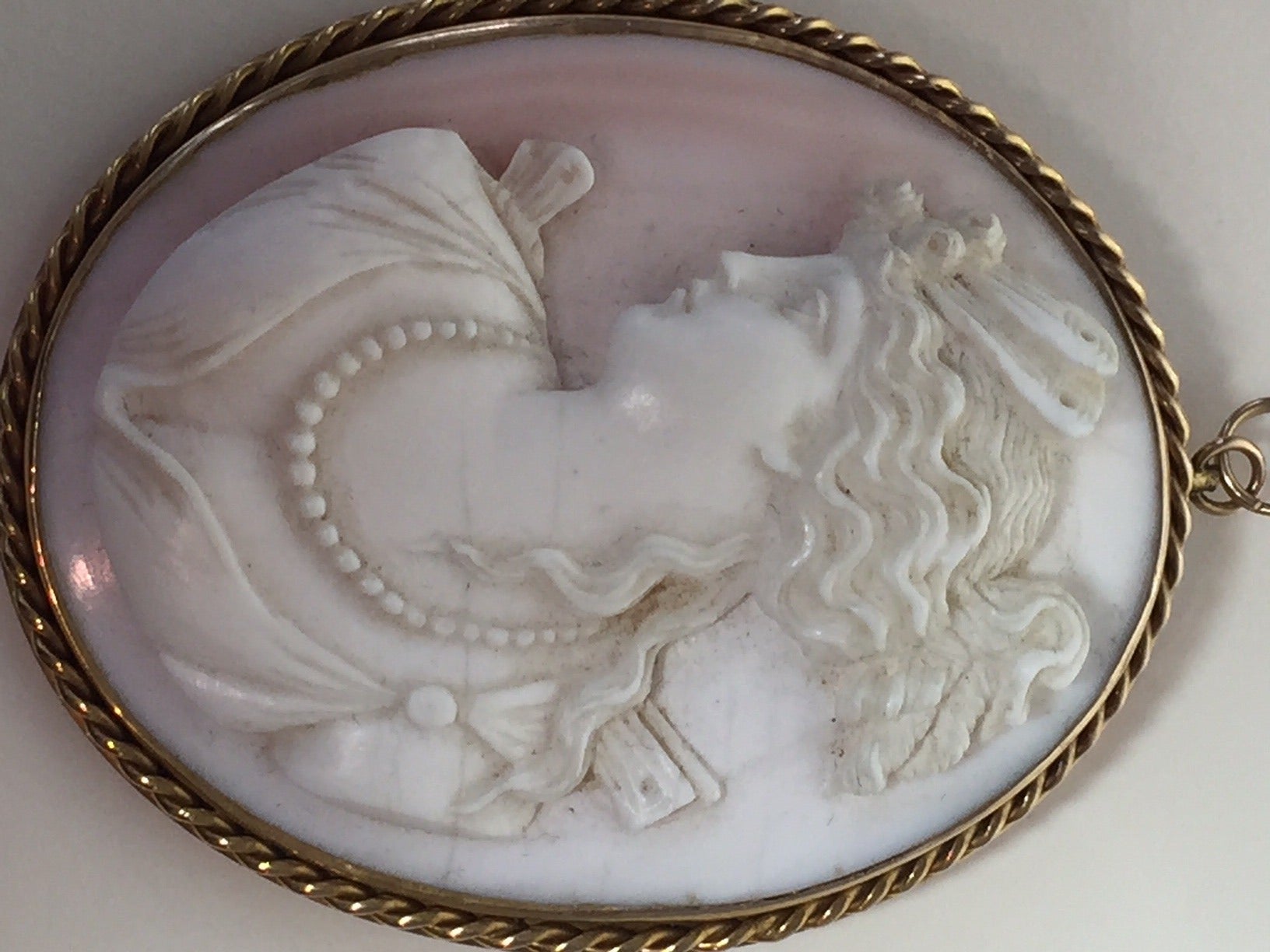 A lovely , large Victorian hand-carved shell cameo brooch/pendant with 14K gold framework.