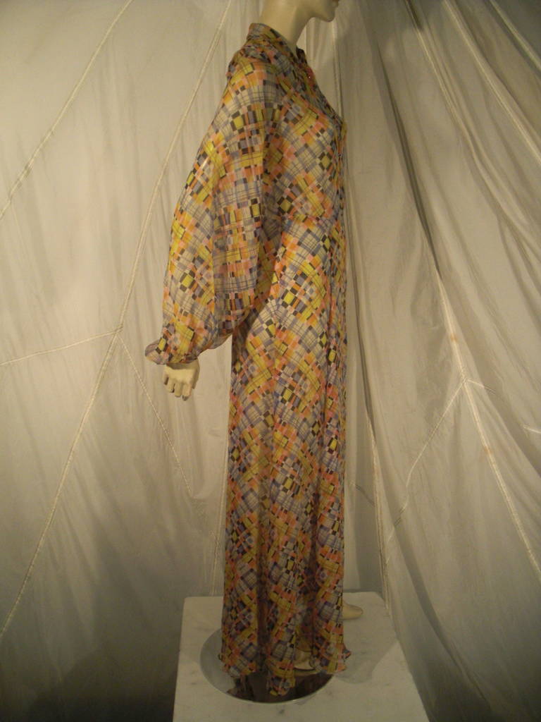 1930s Whimsical Plaid Print Silk Chiffon Gown with Balloon Sleeves

Shirt Collar and Buttons to Waist