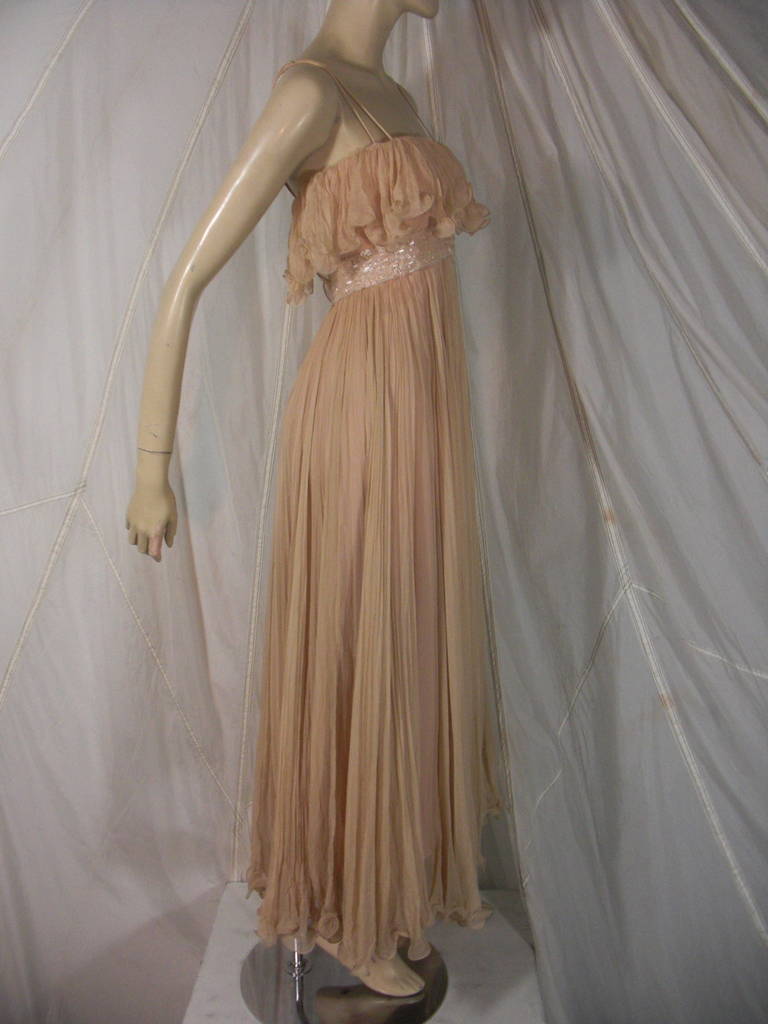 1970s Alfred Bosand Nude Illusion Maxi Dress in Silk Chiffon
Featuring Elaborate Bugle Beaded Waist Band