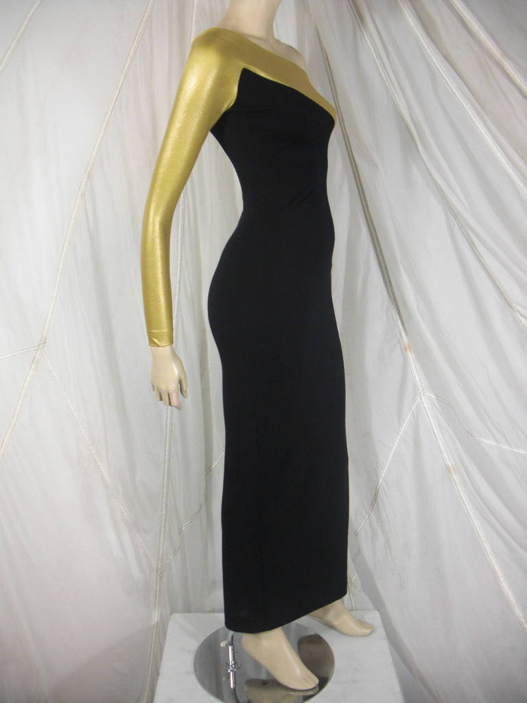 1990s Donna Karen Gold and Black Asymetrical Evening Gown
Fine light wool knit with gold lycra