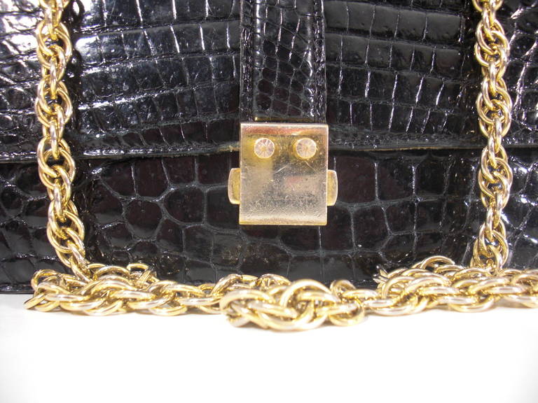 1960s Saks 5th Avenue Alligator Bag with Gold Chain Handle

Some wear on handle