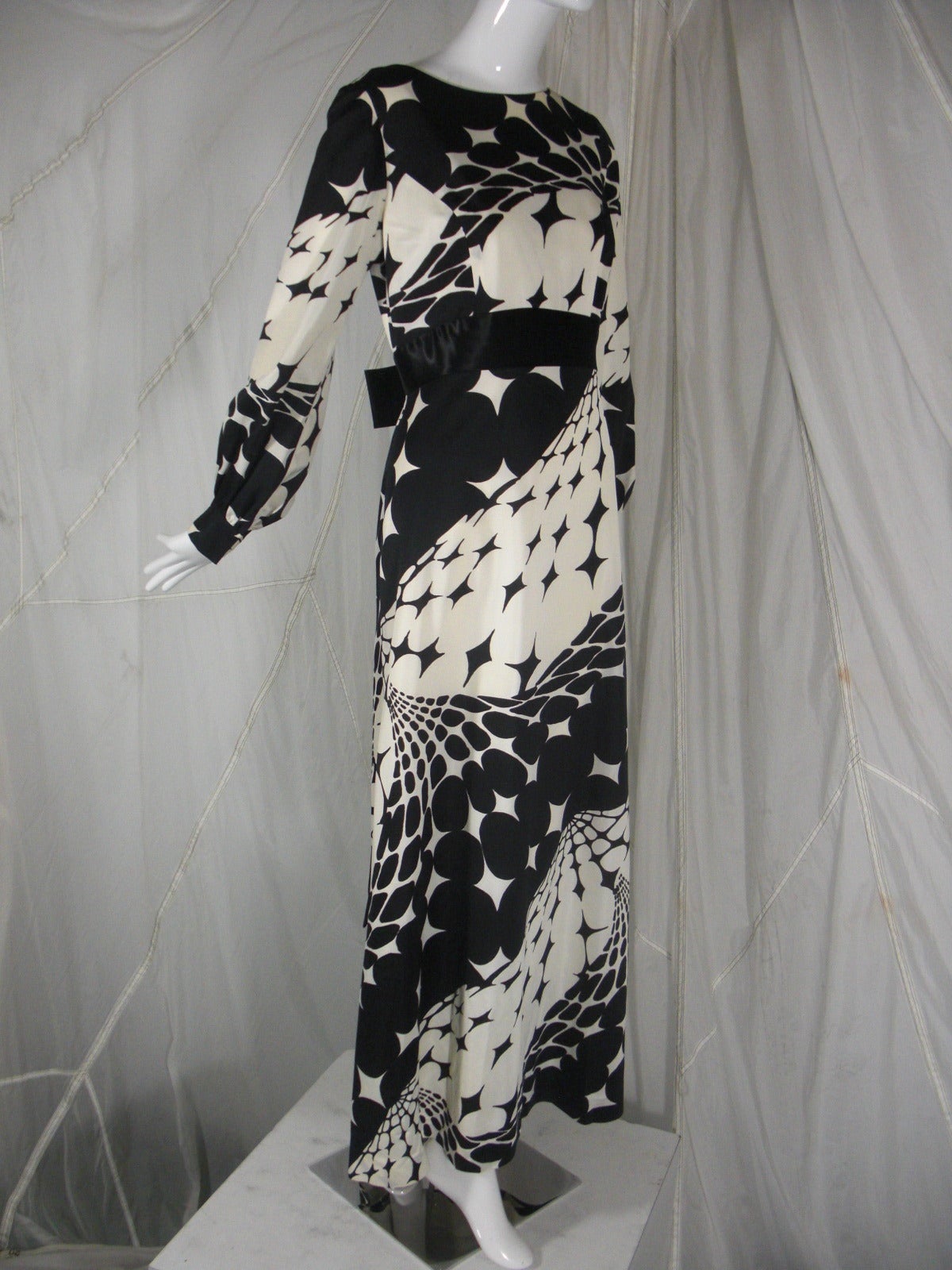 1970s Estevez Black and White Abstract Jersey Maxi Dress

Feminine Silhouette with Full Sleeve 
Sash at Waist in Satin and Low Square Back with Bow