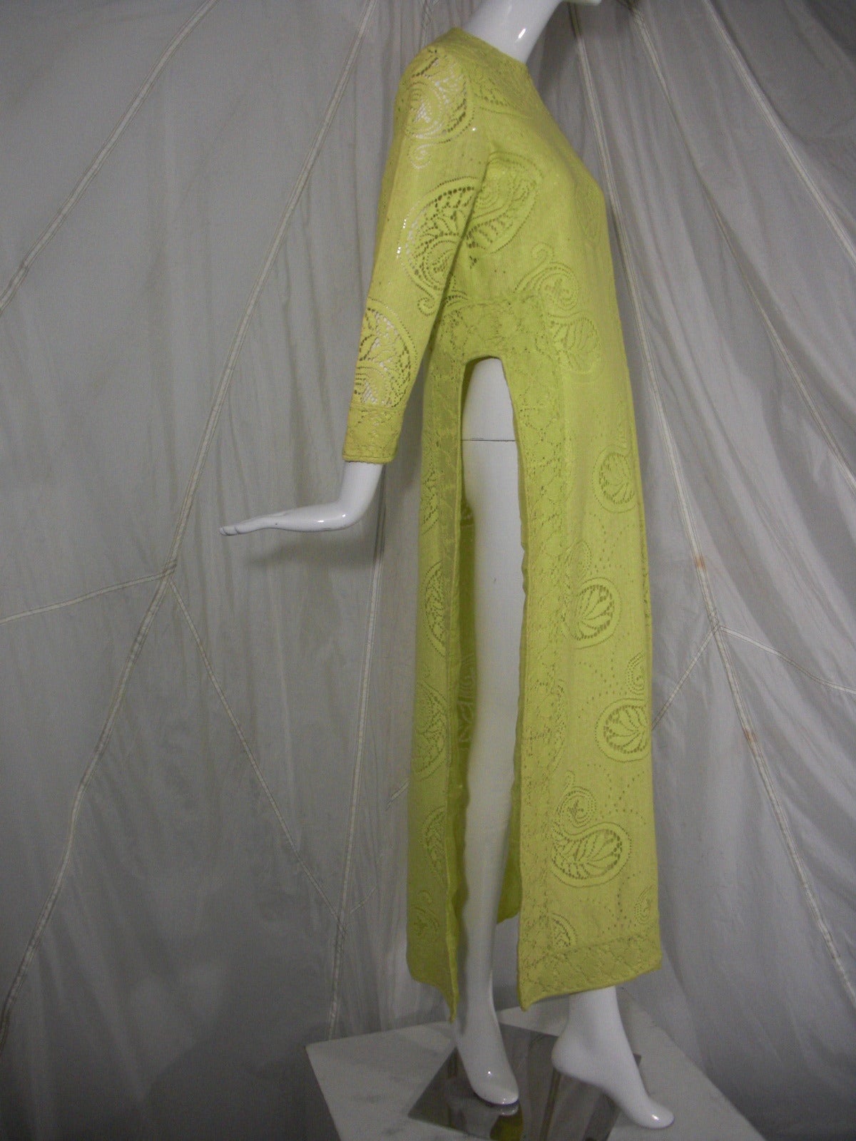 1960s Rebecca Chartreuse Tunic in Paisley Lace

Beautiful and Simply Tailored

High Side Slits 

Fabric of Import Cotton Lace