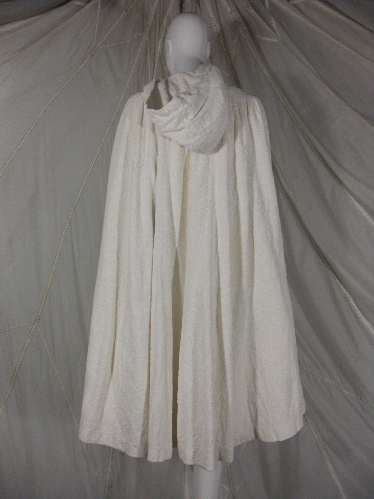 white cape with hood