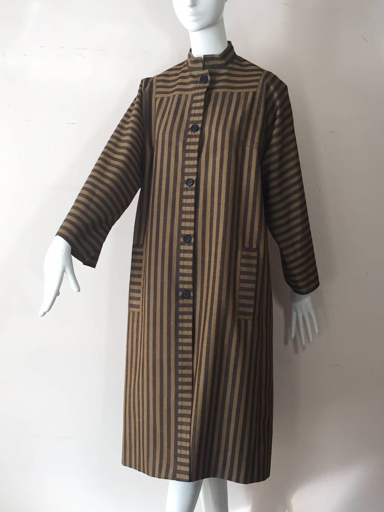 A great 1980s beautifully tailored Hubert de Givenchy, charcoal and Khaki striped viscose gabardine smock with front pockets, button-down front and contrasting stripe shoulder yolk. 