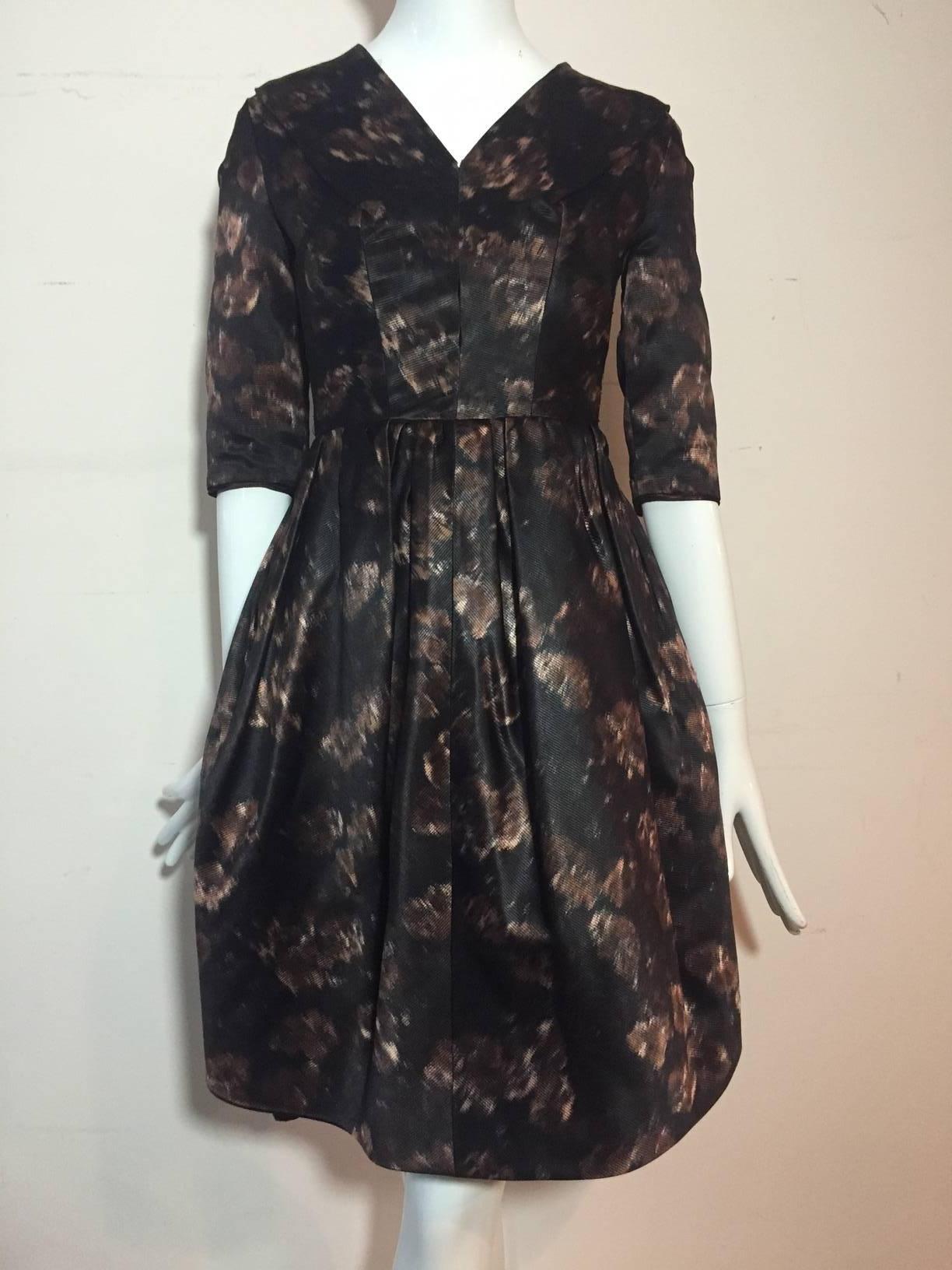 A fabulous 1950s abstract floral silk dress in black brown and taupe:  3/4 length sleeves, 