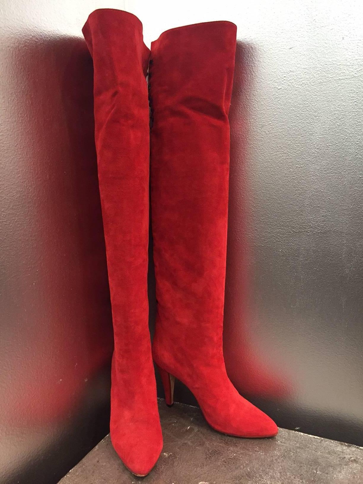 1980s Andra Pfister, barely-worn, red suede over-the-knee boots. Slip-on style with decorative lacing at back.  Fold-over throat.  3.5