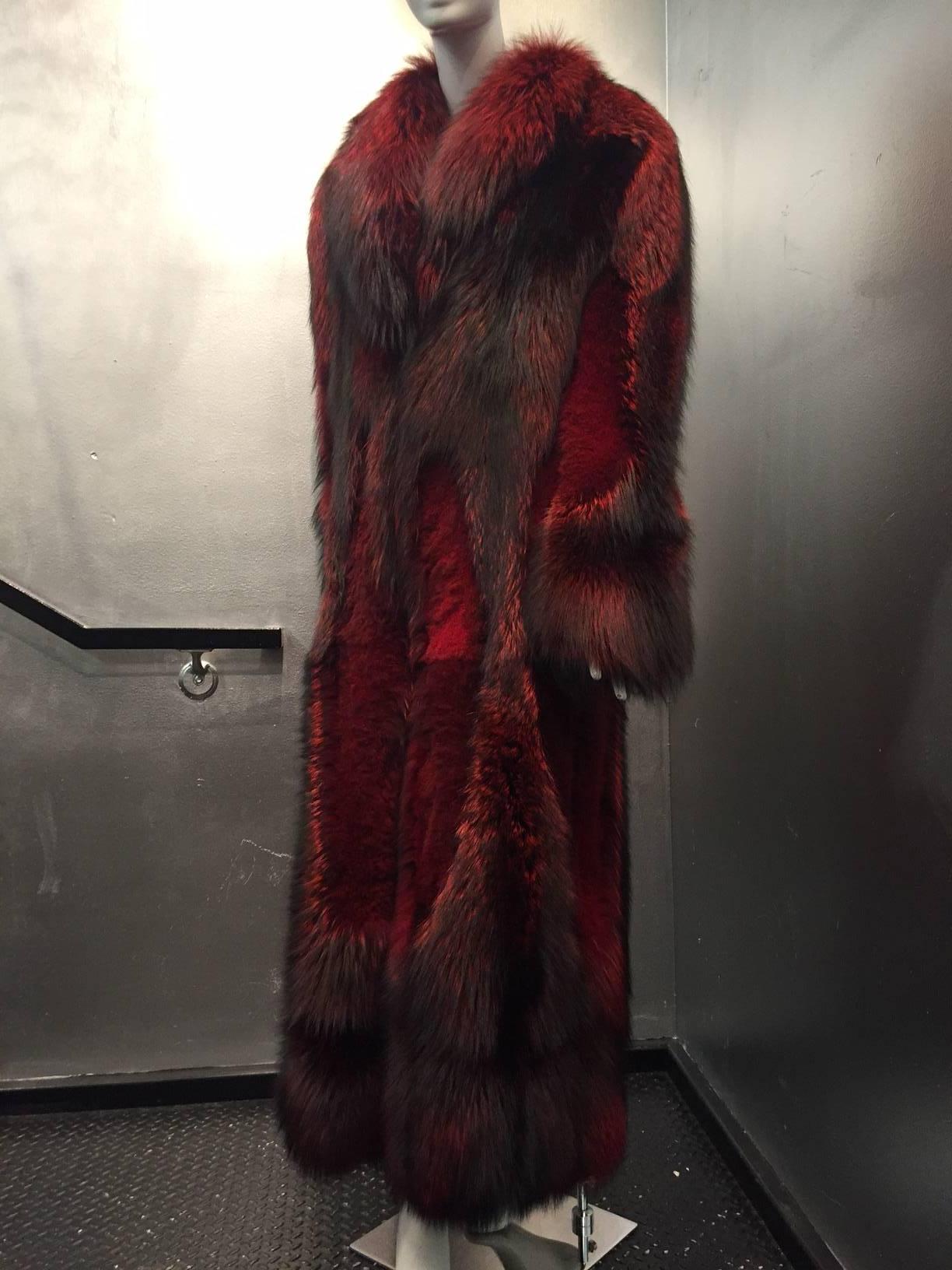 A beautiful and unusual Roberto Cavalli fox fur full-lenght coat:  Overdyed in scarlet red, lined in silk sharkskin fabric. Dense and lush fur appearance with light weight ease. 