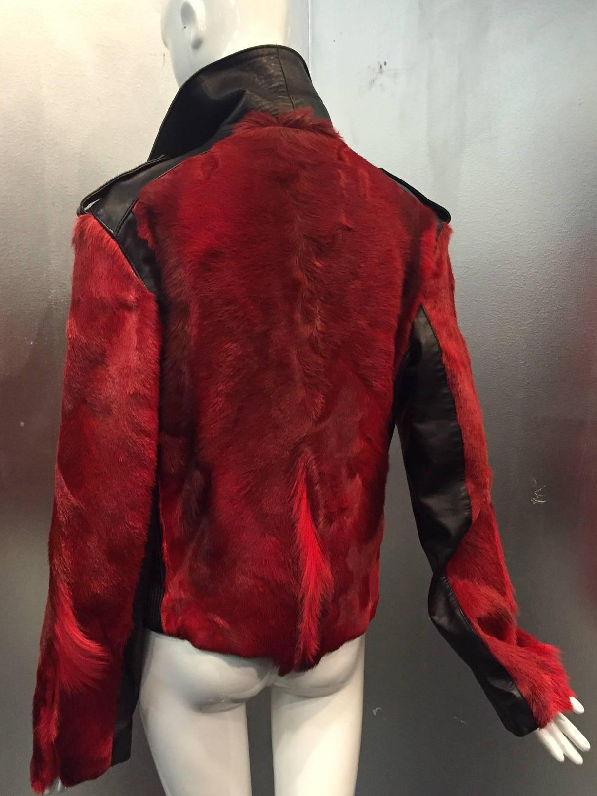 An iconic Dolce & Gabanna motorcycle look in red dyed goat hide and black leather.  
