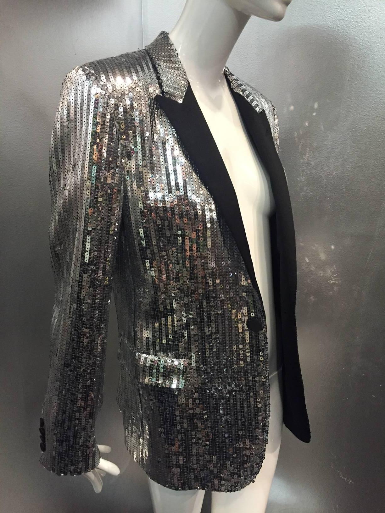 A fabulous Hedi Slimane for Saint Laurent menswear silver sequin tuxedo jacket with satin lapels!  Single button style with flap pockets. 