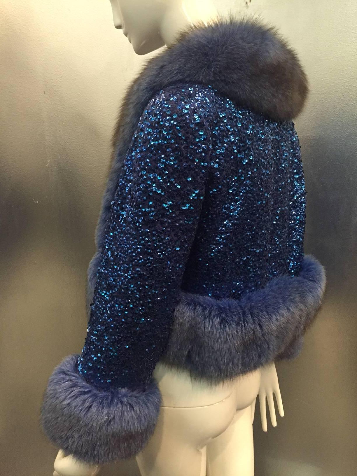 1960s cobalt blue sequin encrusted wool bolero jacket with blue dyed fox trim on cuffs and around entire jacket. Silk lined, no closure. Attributed to Travilla.