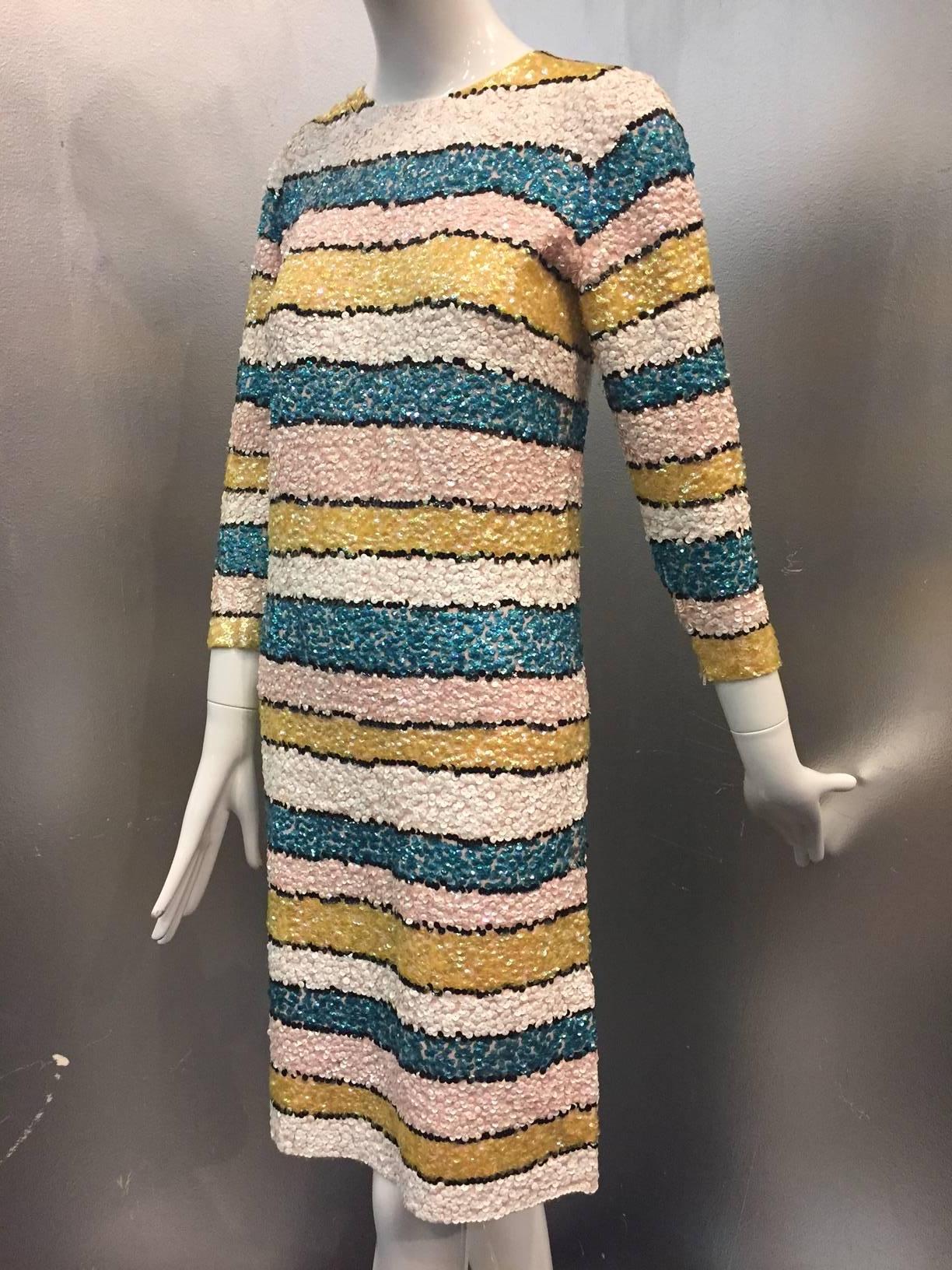 1960s Imperial pale pink wool knit striped sequin cocktail dress in Easter pastels with zippered cuffs and back. 