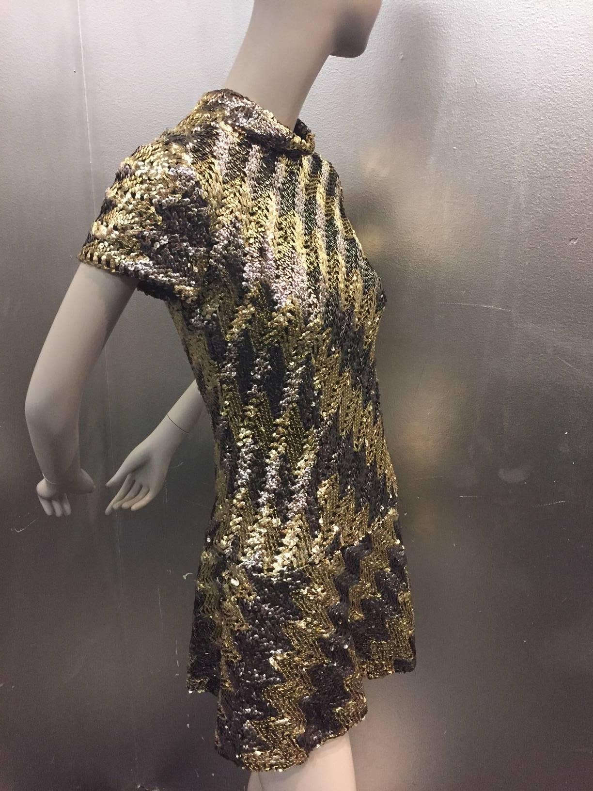 1960s Pat Sandler silver and gold sequin and taffeta dropped waist micro mini with short sleeves, rolled neck and back zipper. 