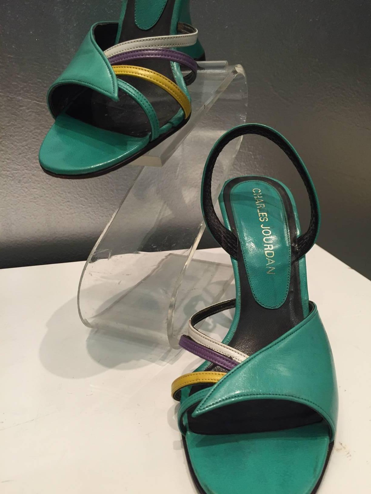 1980s Charles Jourdan turquoise slingback, open-toe sandal with white, lavender, and gold side straps and Ferragamo 1940s inspired cut-in wedge heel.  Size 5 B