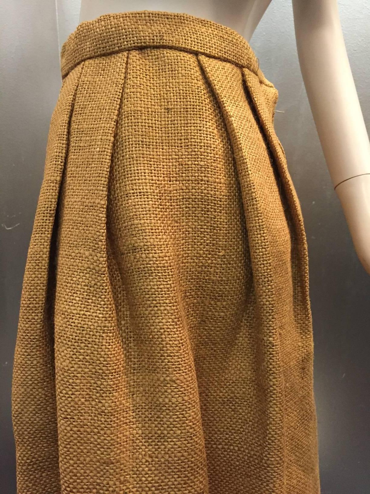 1960s Italian burlap pleated and fringed skirt with hand-painted mushroom detail. Zippered Back, hook and eye closure on banded waist. 